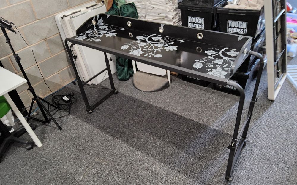 Lot 276: Adjustable overbed Shelf / table on wheels
