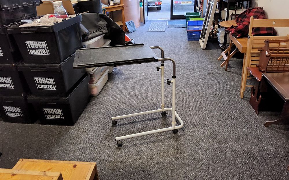Lot 281: Height adjustable Table on wheels