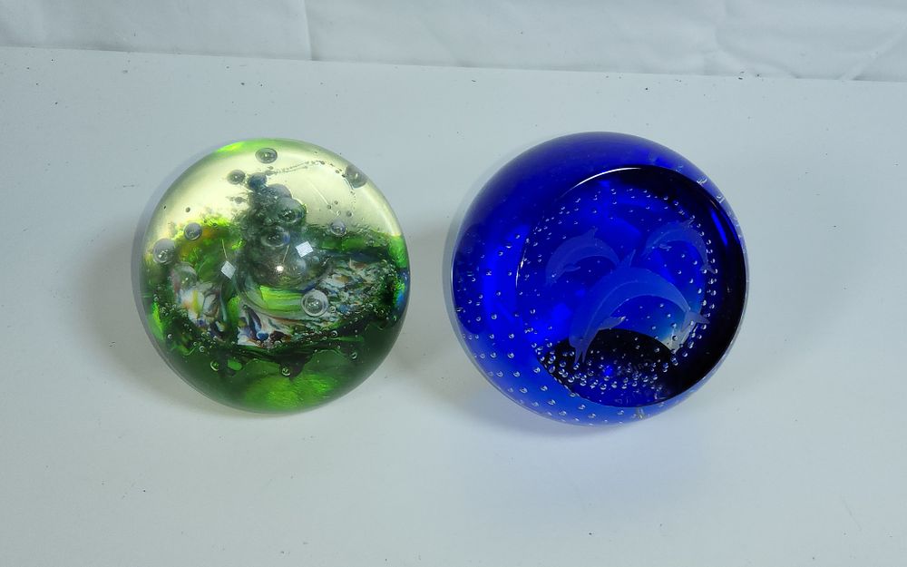 Lot 154: Two collectable glass paperweights produced by Caithness Glass in Scotland