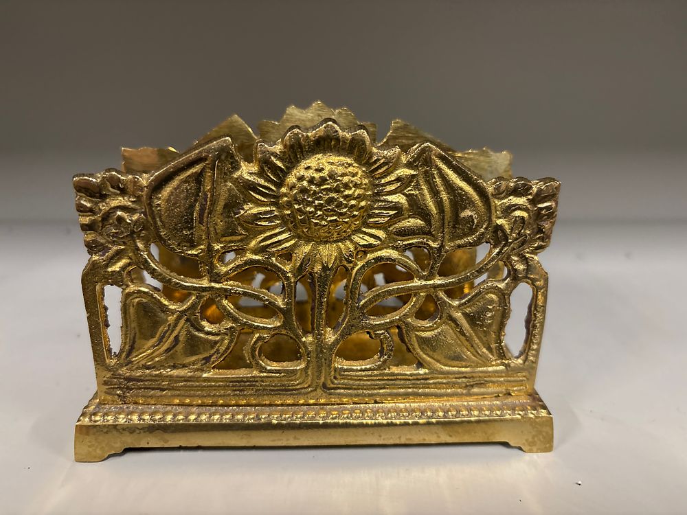 Lot 167: Brass Sunflower Design Letter Rack