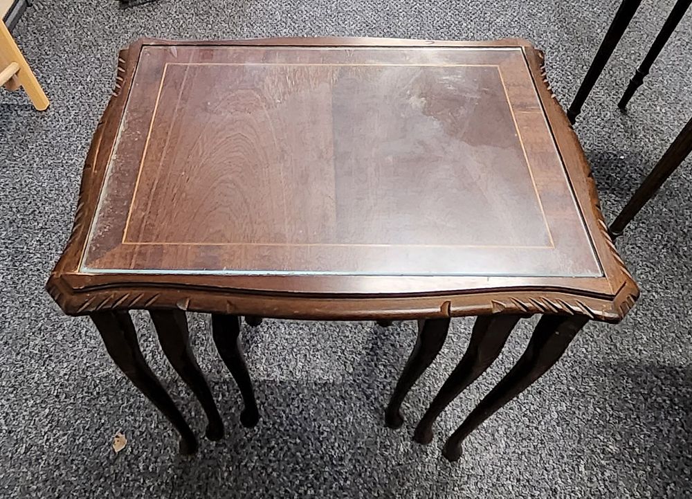 Lot 193: Nest of tables .