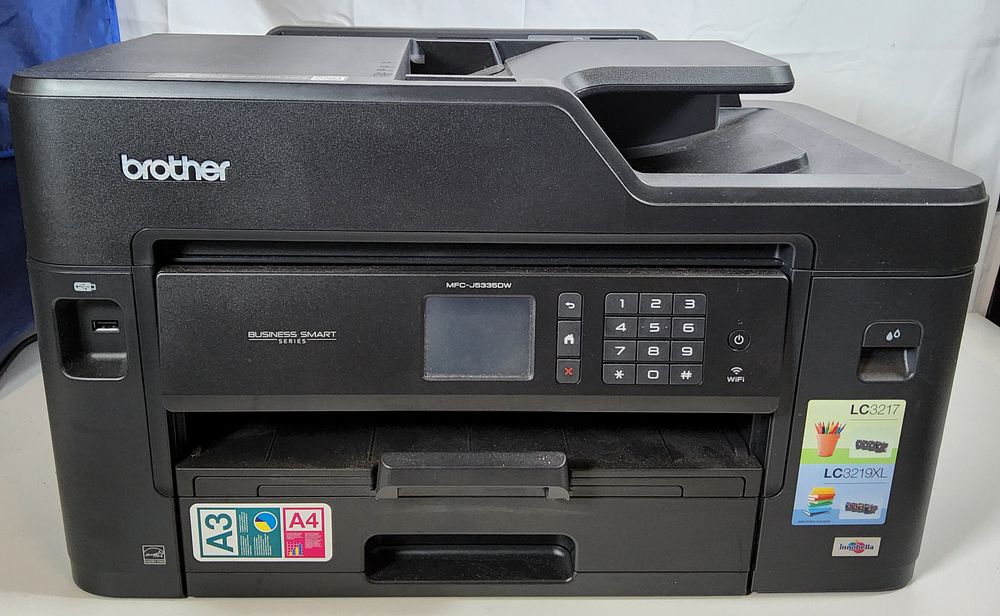 Lot 205: Brother "Business Smart" Series printer.