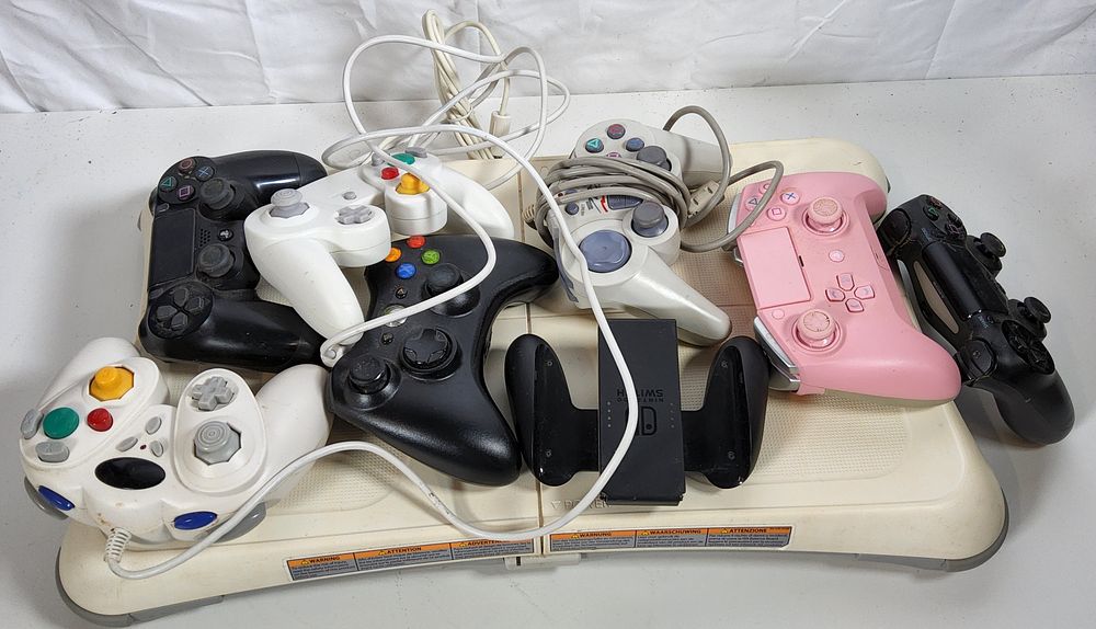 Lot 211: Wii "Balance Board" & Various Controllers.
