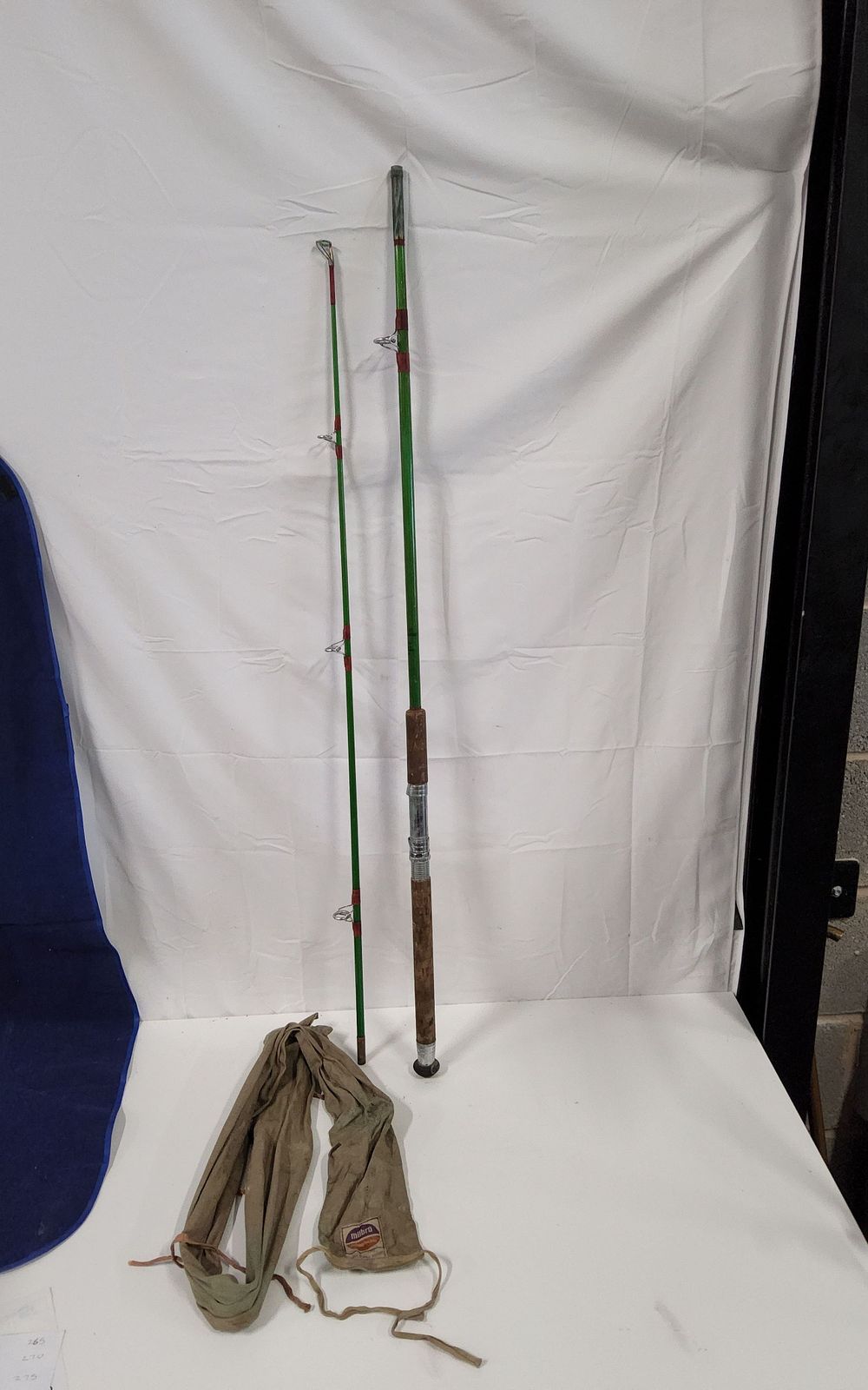 Lot 227: 2 piece beach caster / boat rod with rod bag