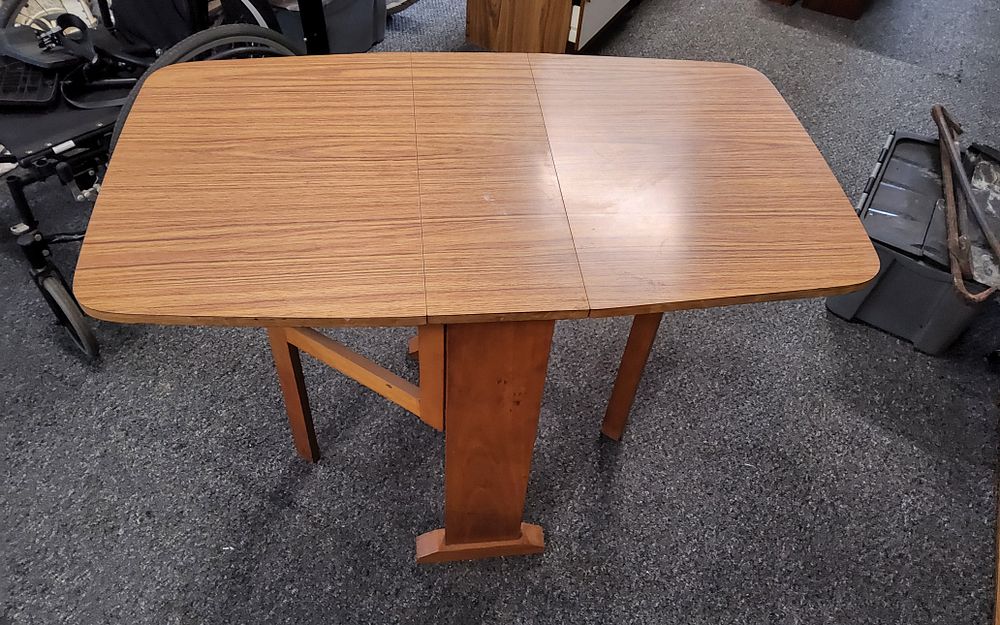 Lot 246: Midcentury compact drop- leaf gate leg dining table
Height 30"