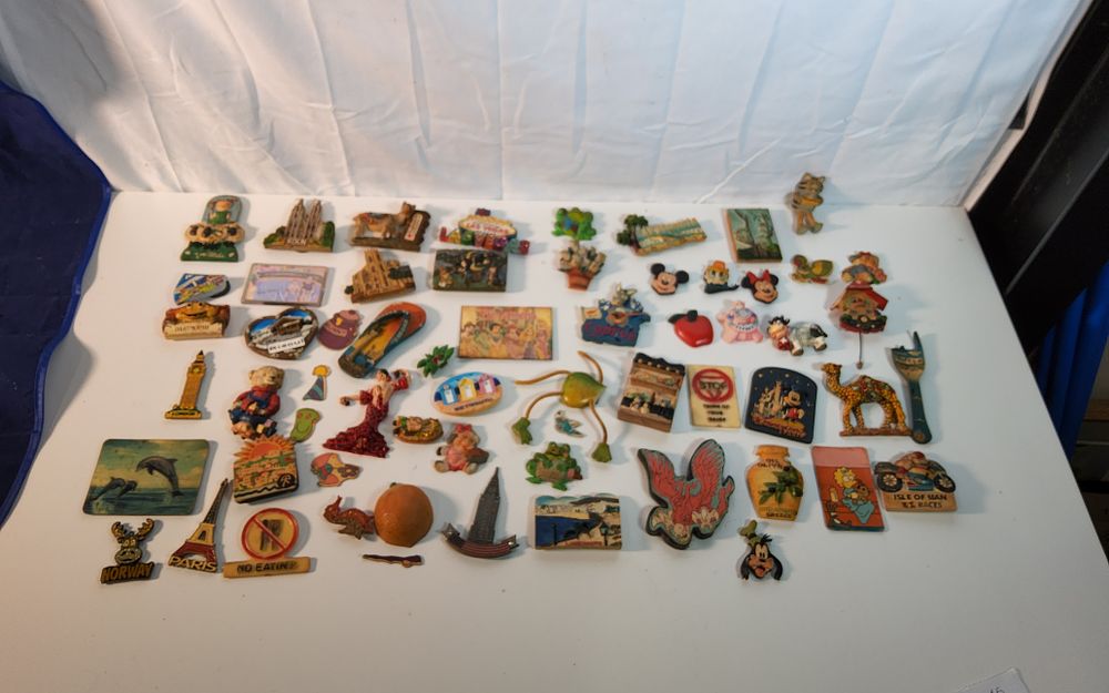Lot 258: 61 collectable fridge magnets