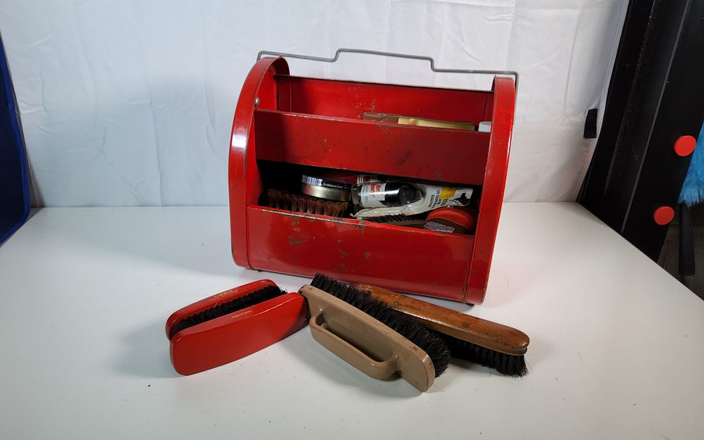 Lot 51: Vintage metal Shu-Shine box with contents