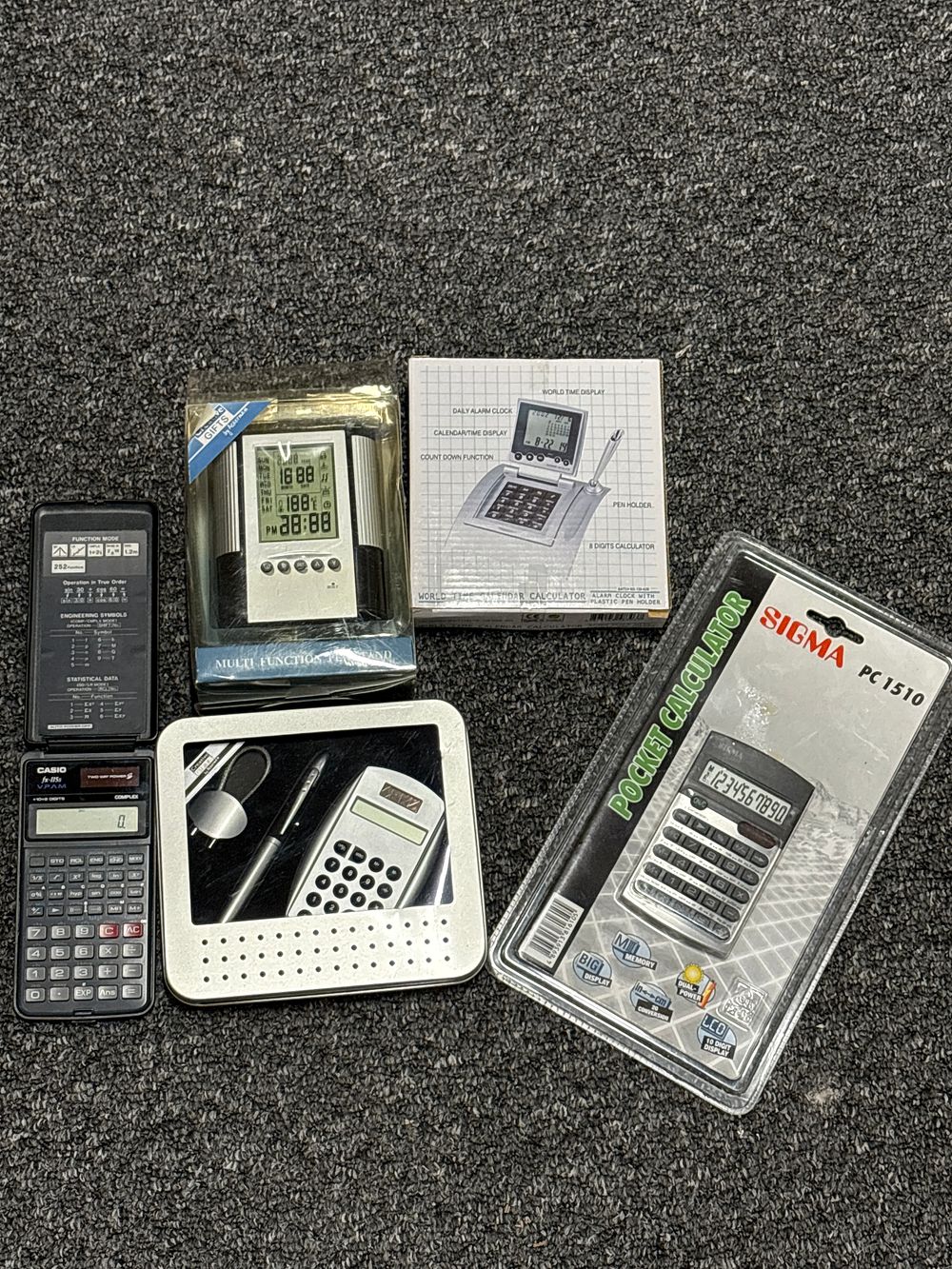 Lot 187: Selection of Calculators and desk stuff