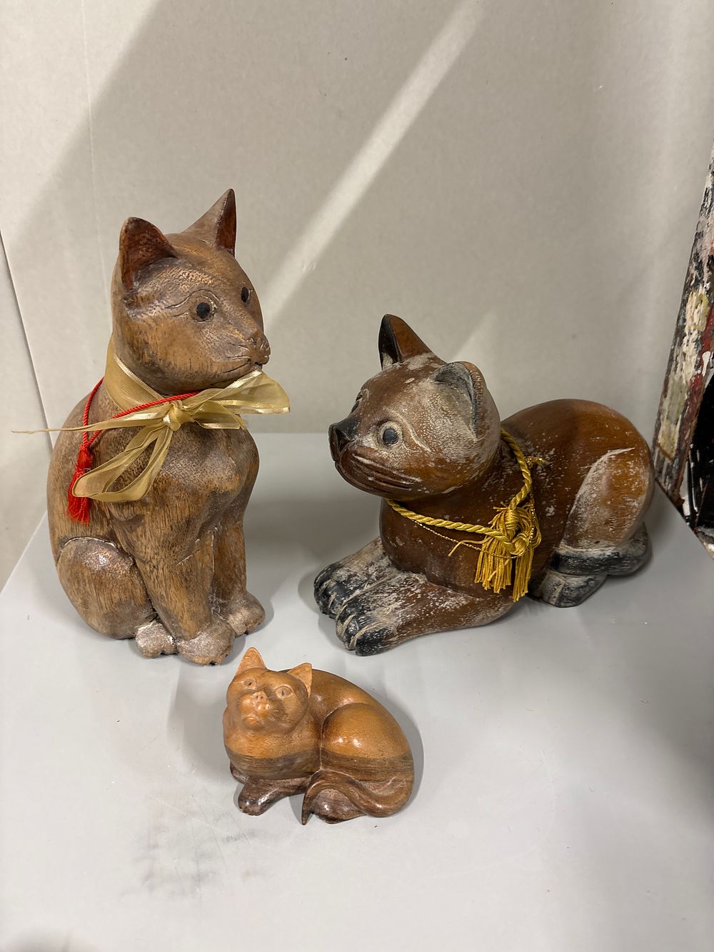 Lot 200: Three Wooden Cat Figures