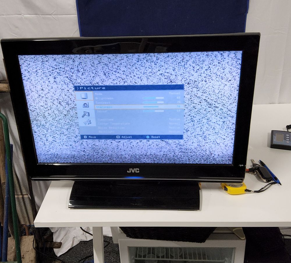 Lot 219: JVC TV with Remote.