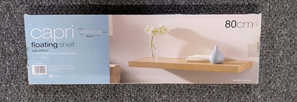 Lot 220: Pair of floating shelves. As pictured.