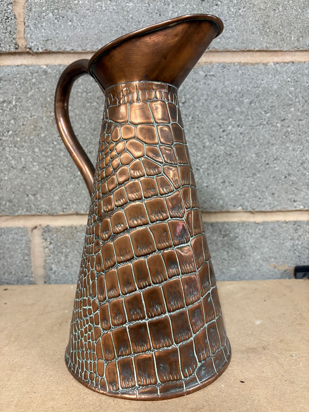 Lot 228: English Arts & Crafts copper pouring jug, likely produced by Joseph Sankey & Sons around 1900