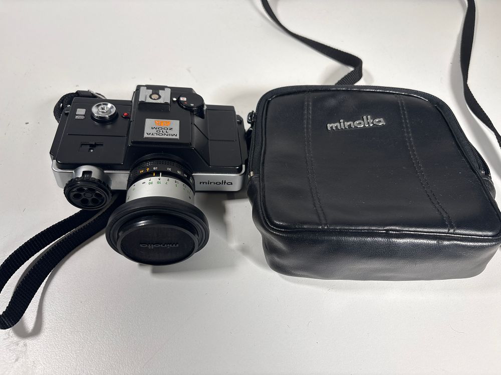 Lot 243: Minolta 110 Zoom SLR Camera