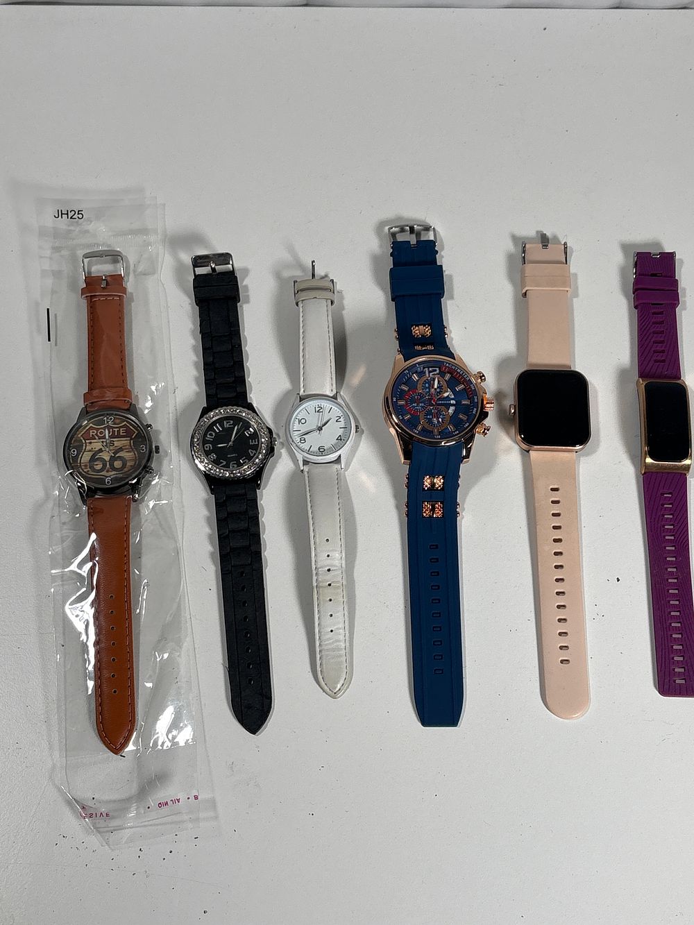 Lot 247: Six various house clearance watches