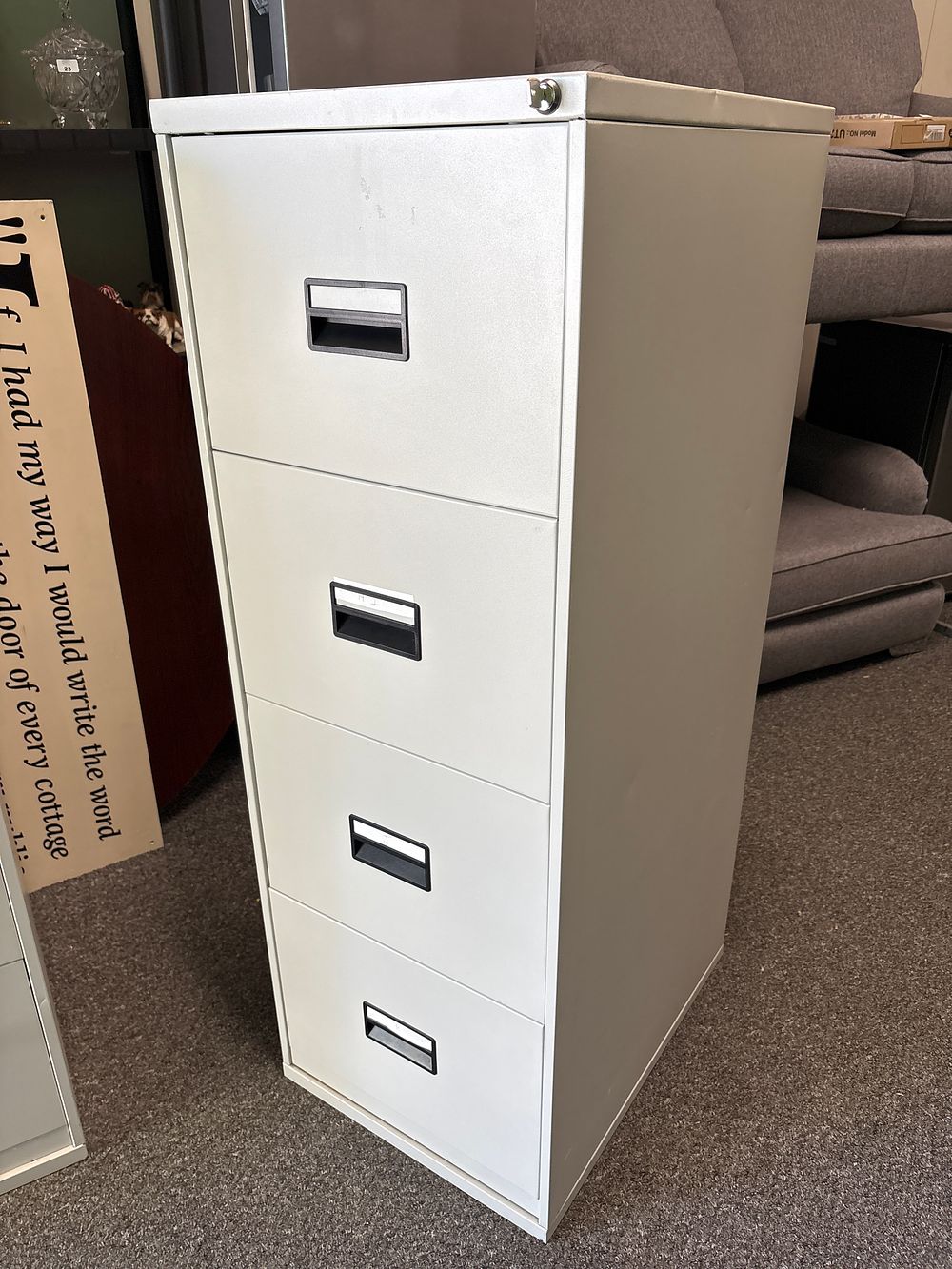 Lot 158: Four drawer Filing cabinet with key