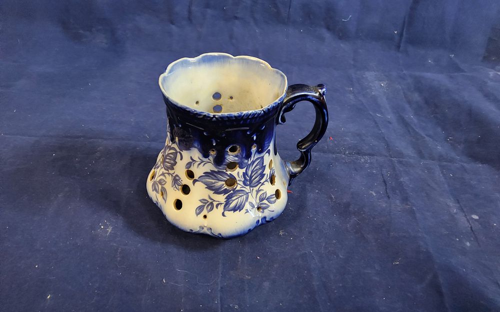 Lot 167: Vintage Gouda style pottery pierced lantern designed with leaves and central candle holder