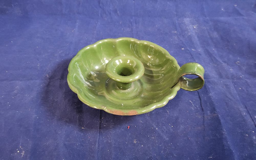 Lot 172: Vintage green enamel scalloped chamber stick candle holder