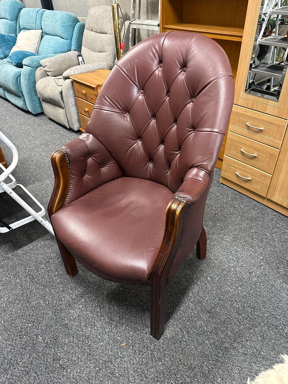 Lot 187: Vintage leather library armchair
