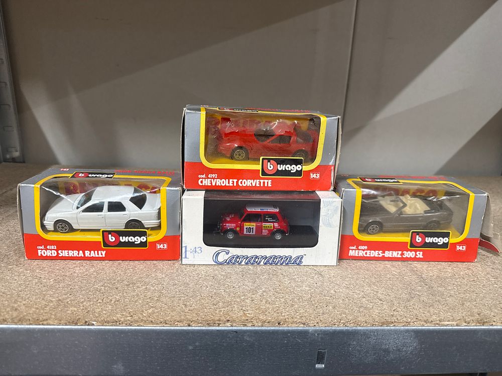 Lot 157: Four Boxed Model Cars