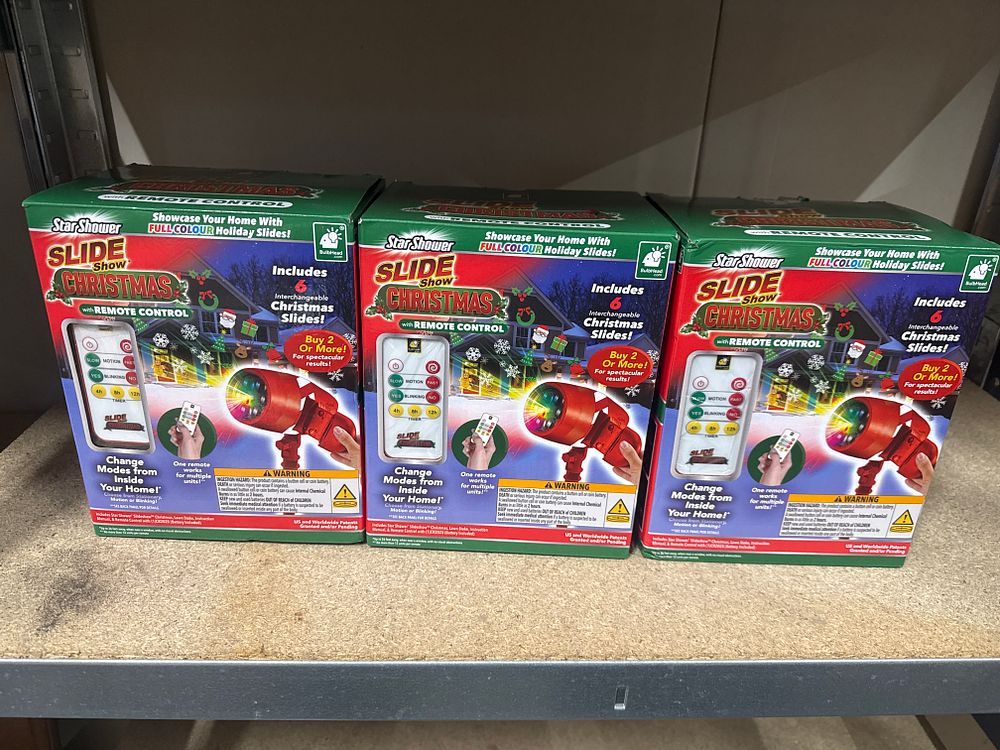 Lot 170: Three Boxed Remote Control Outdoor Christmas Projectors