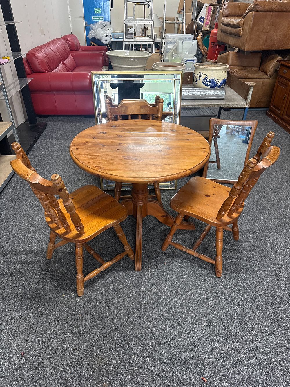 Lot 162: Three Pieces of Late 20th Century Pine Dining Furniture comprising a Circular Table and 3 pine Chairs