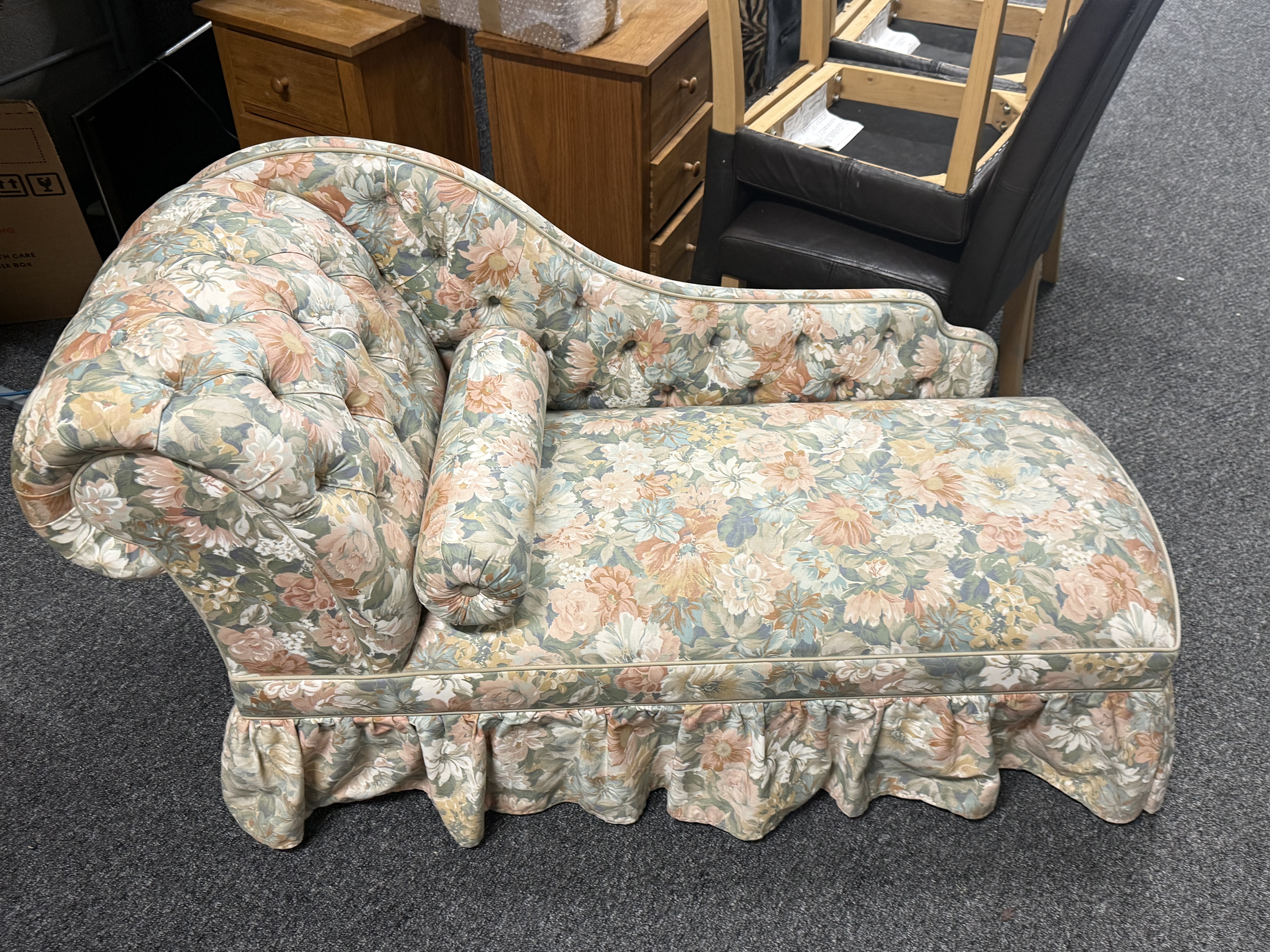 A late 20th century floral upholstered button back chaise longue