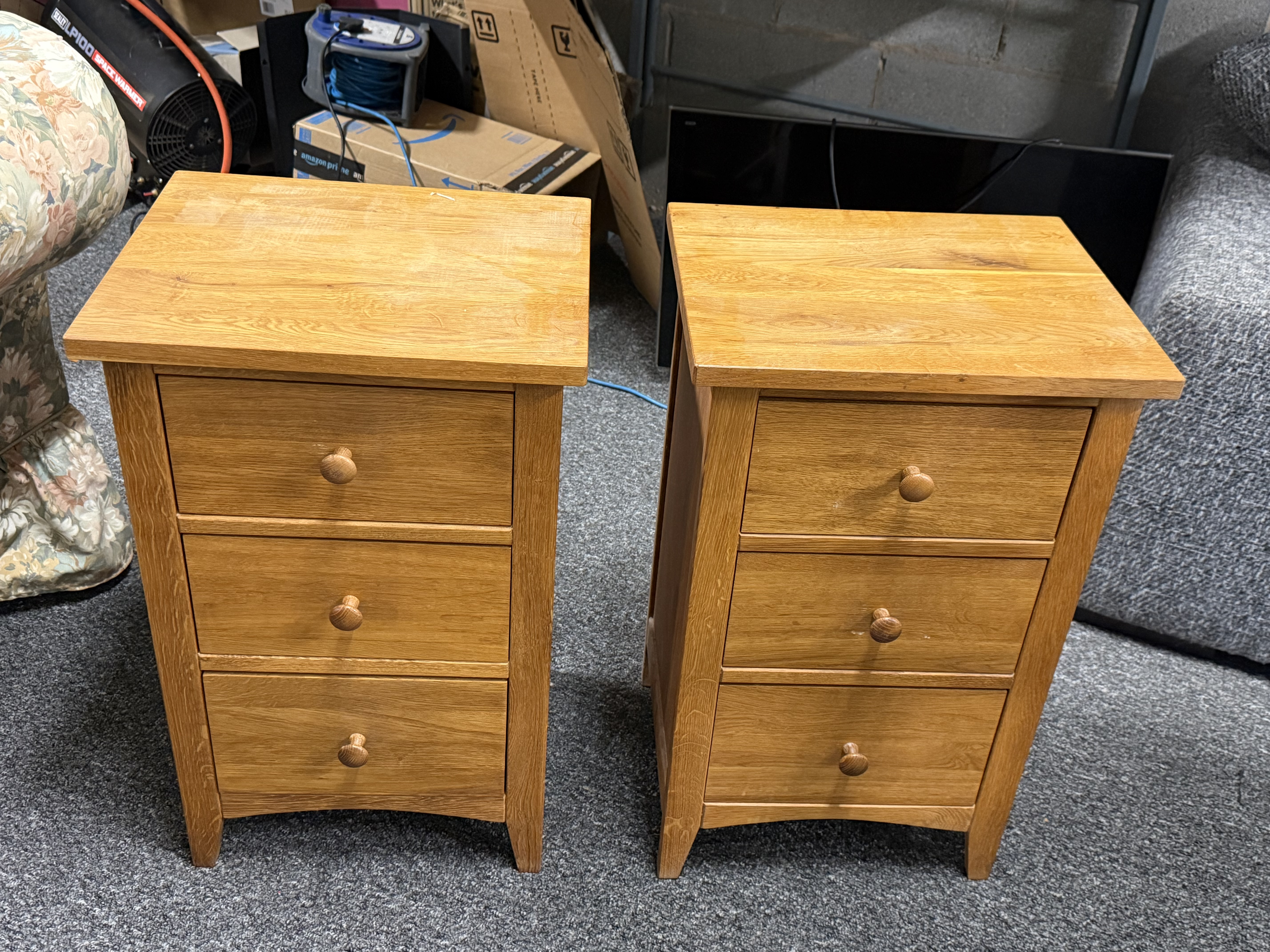 A pair of Harvard slim three drawer light oak bedside chests