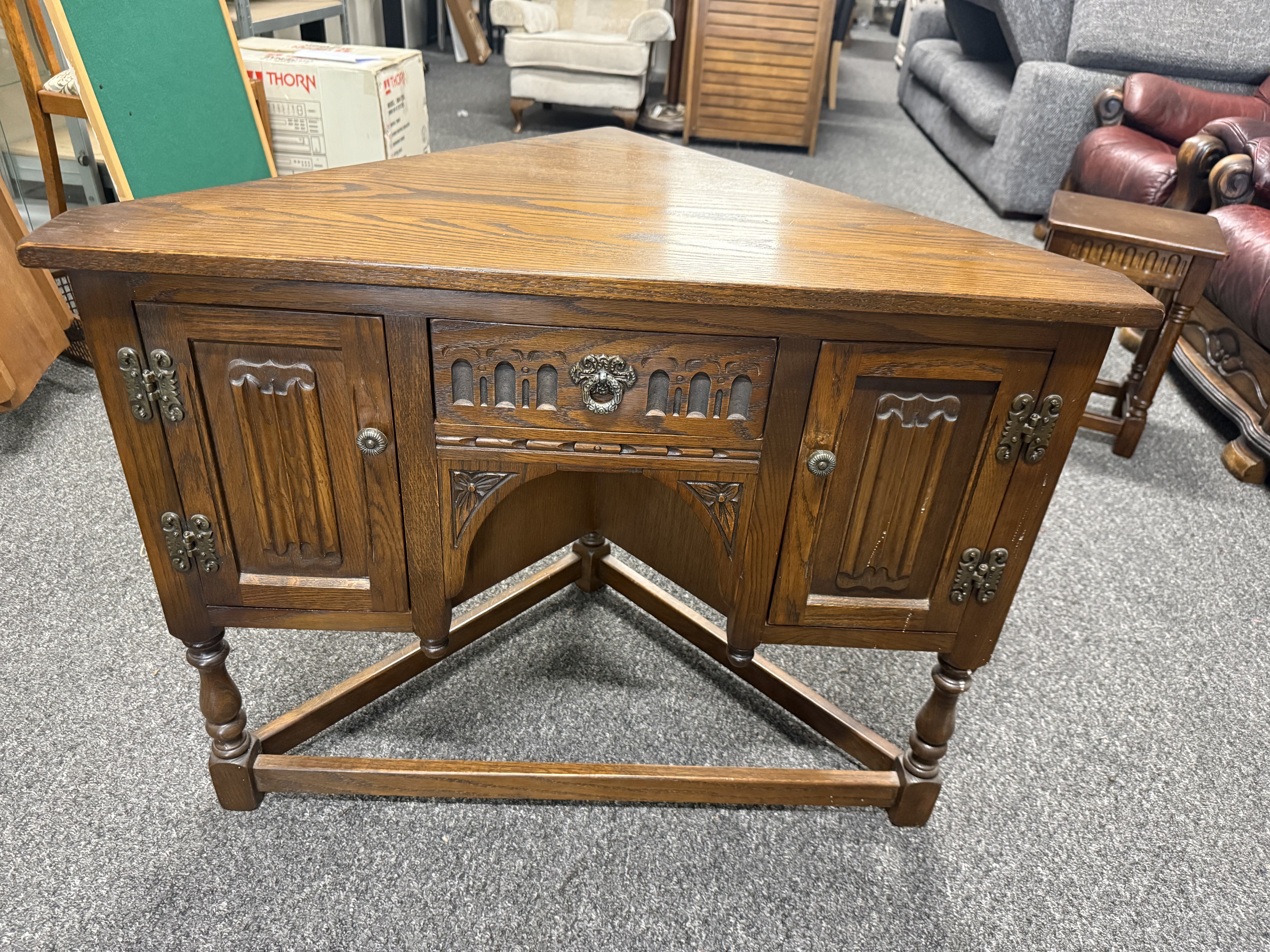 Old Charm Tudor revival carved oak corner sideboard cabinet