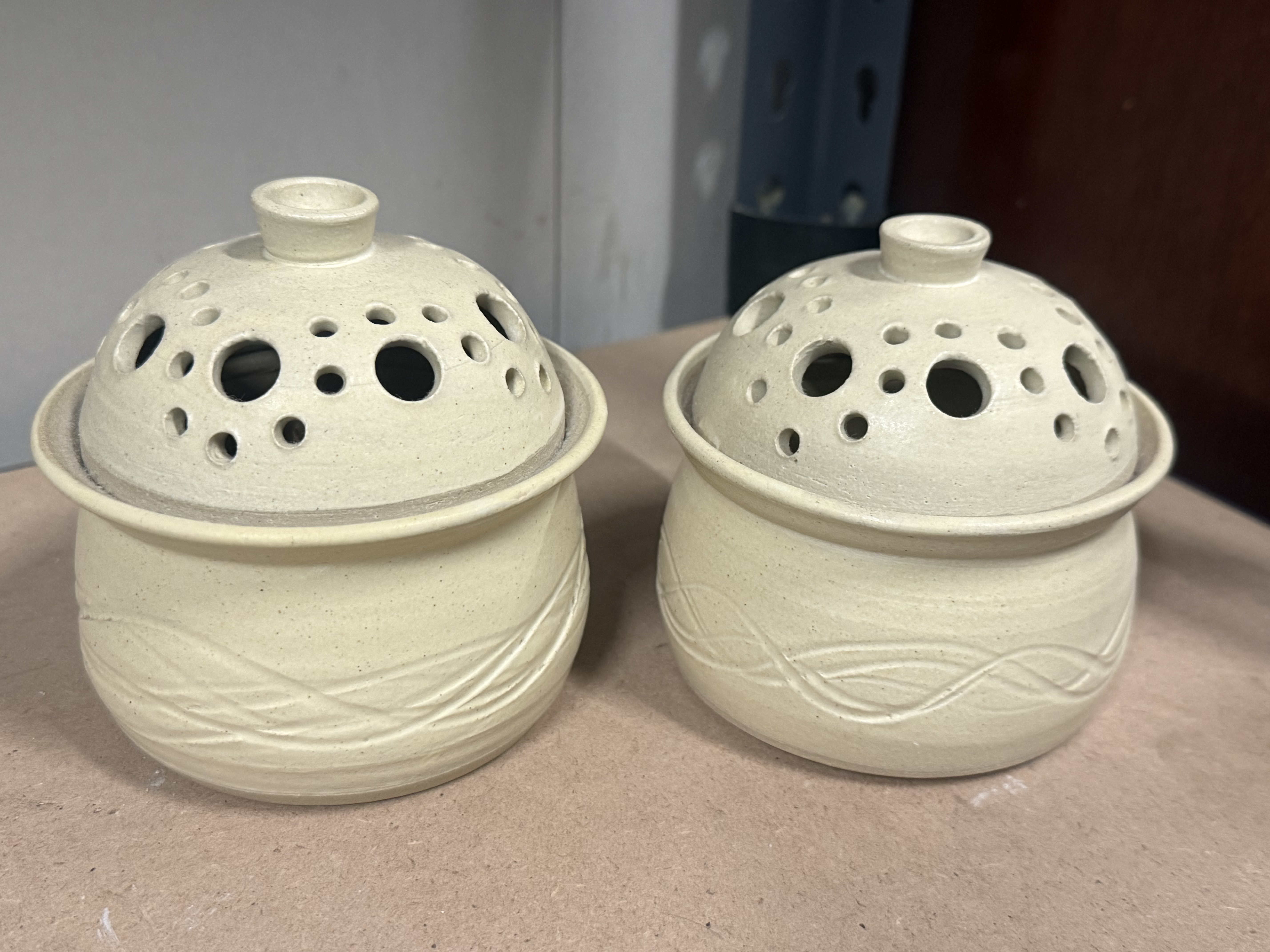 A Pair of Jose Ceramics Stoneware Garlic Keepers