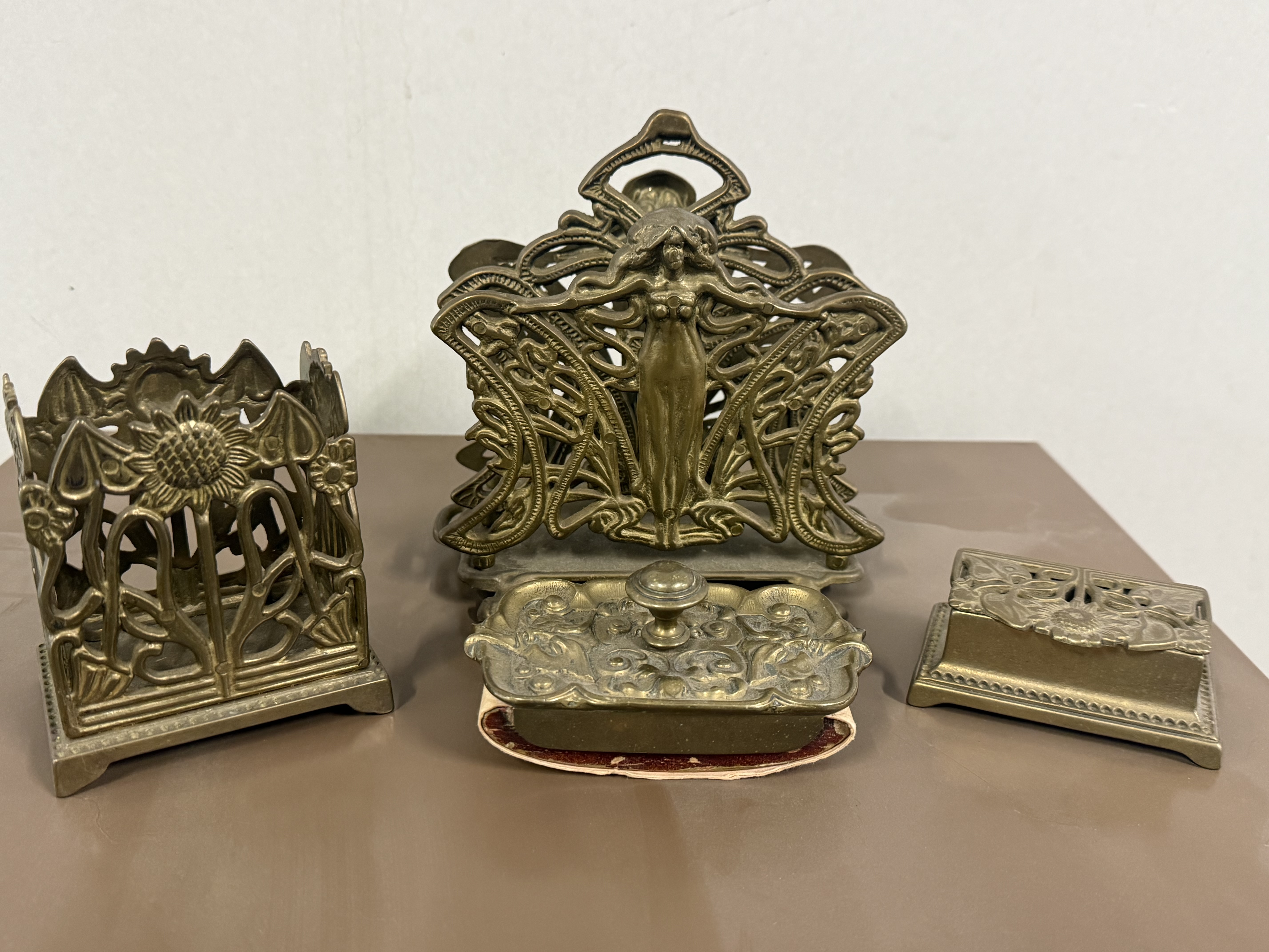 A Set of Art Nouveau Cast Brass Desk Accessories