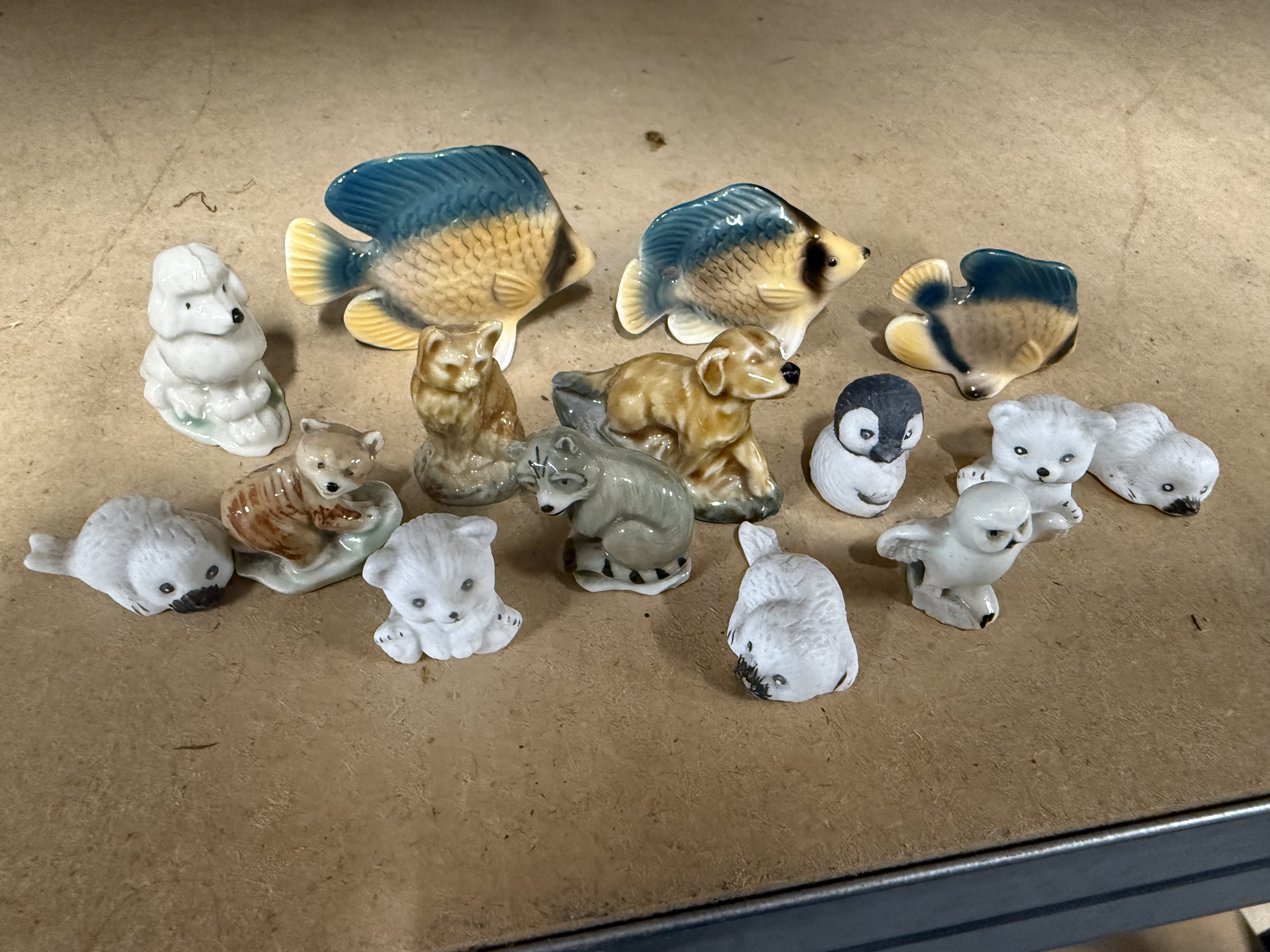 A Collection of Fifteen incl Wade Whimsies Miniature Animal Figurines