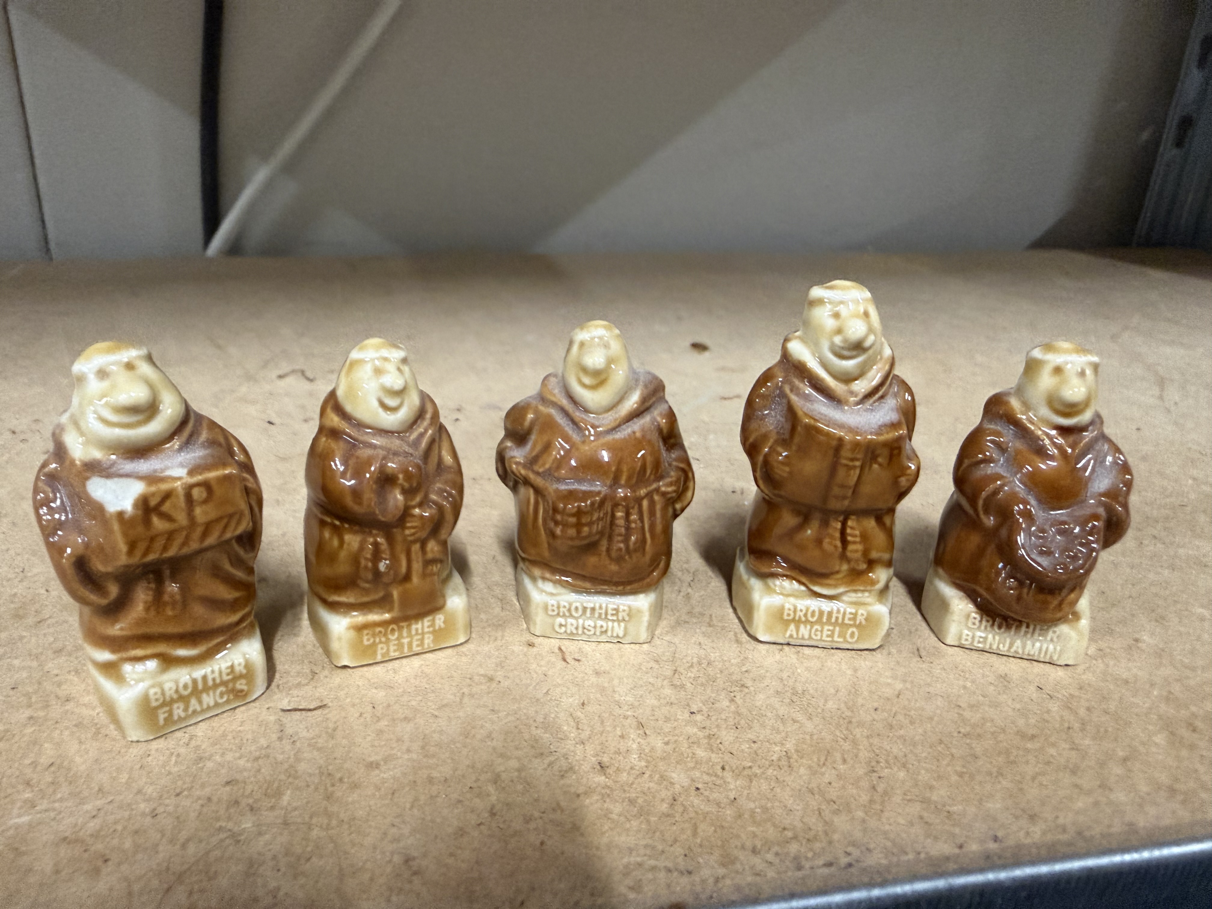 A set of five vintage Wade KP Friar monk figurines