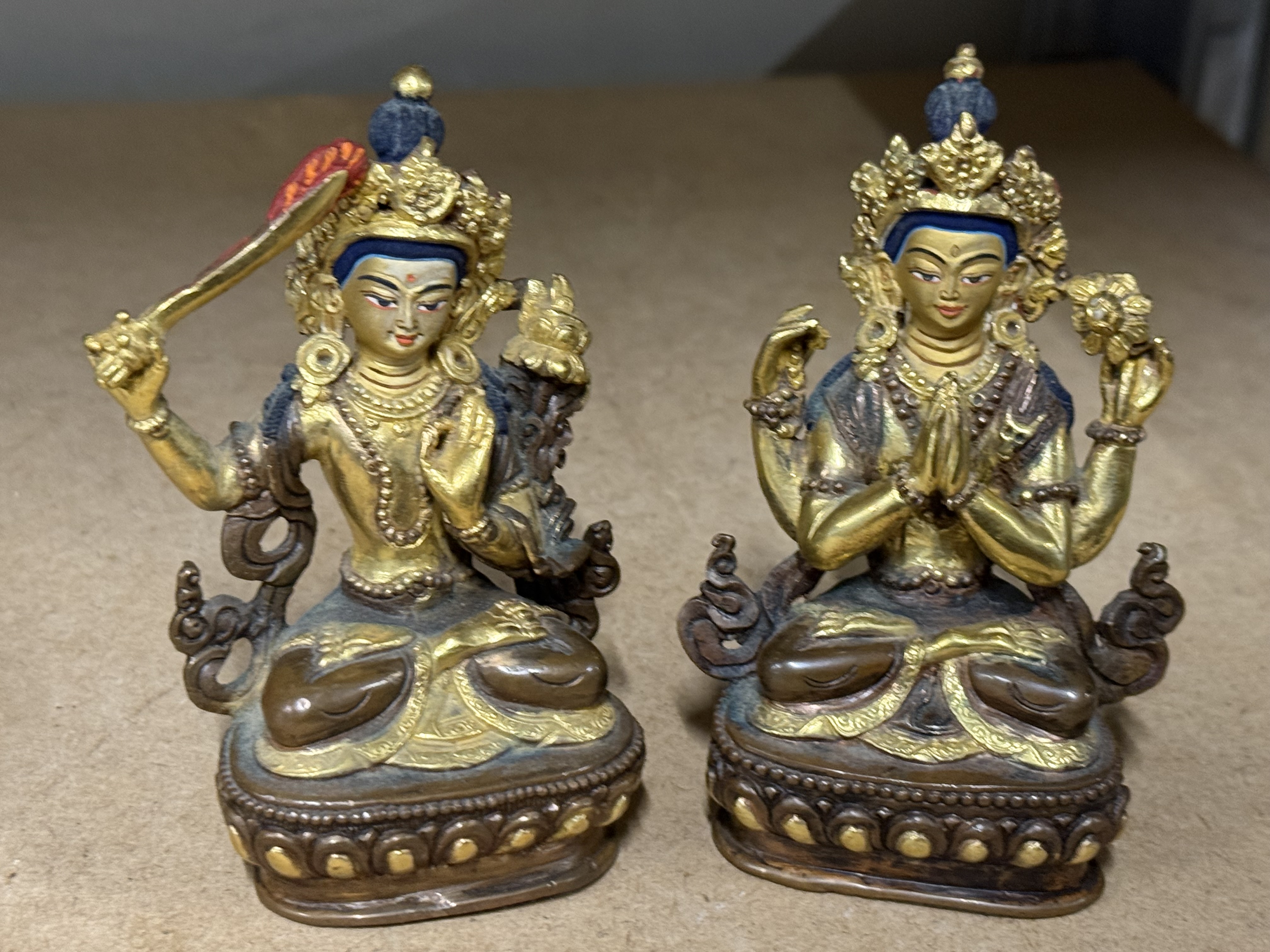 A pair of Himalayan bronze figures of Manjushri and Avalokiteshvara