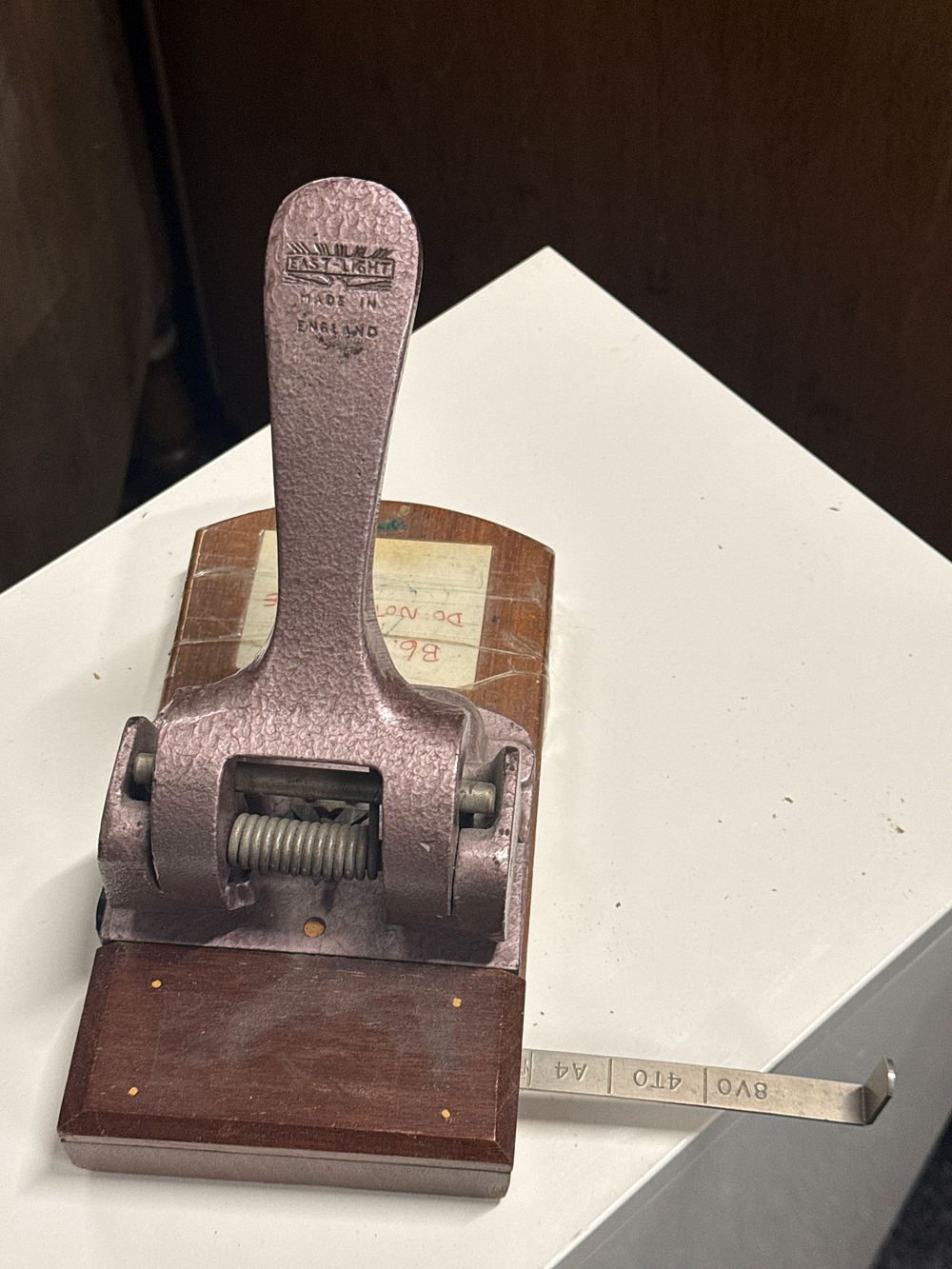Lot 164: Vintage East-Light heavy-duty metal and wood desk hole punch