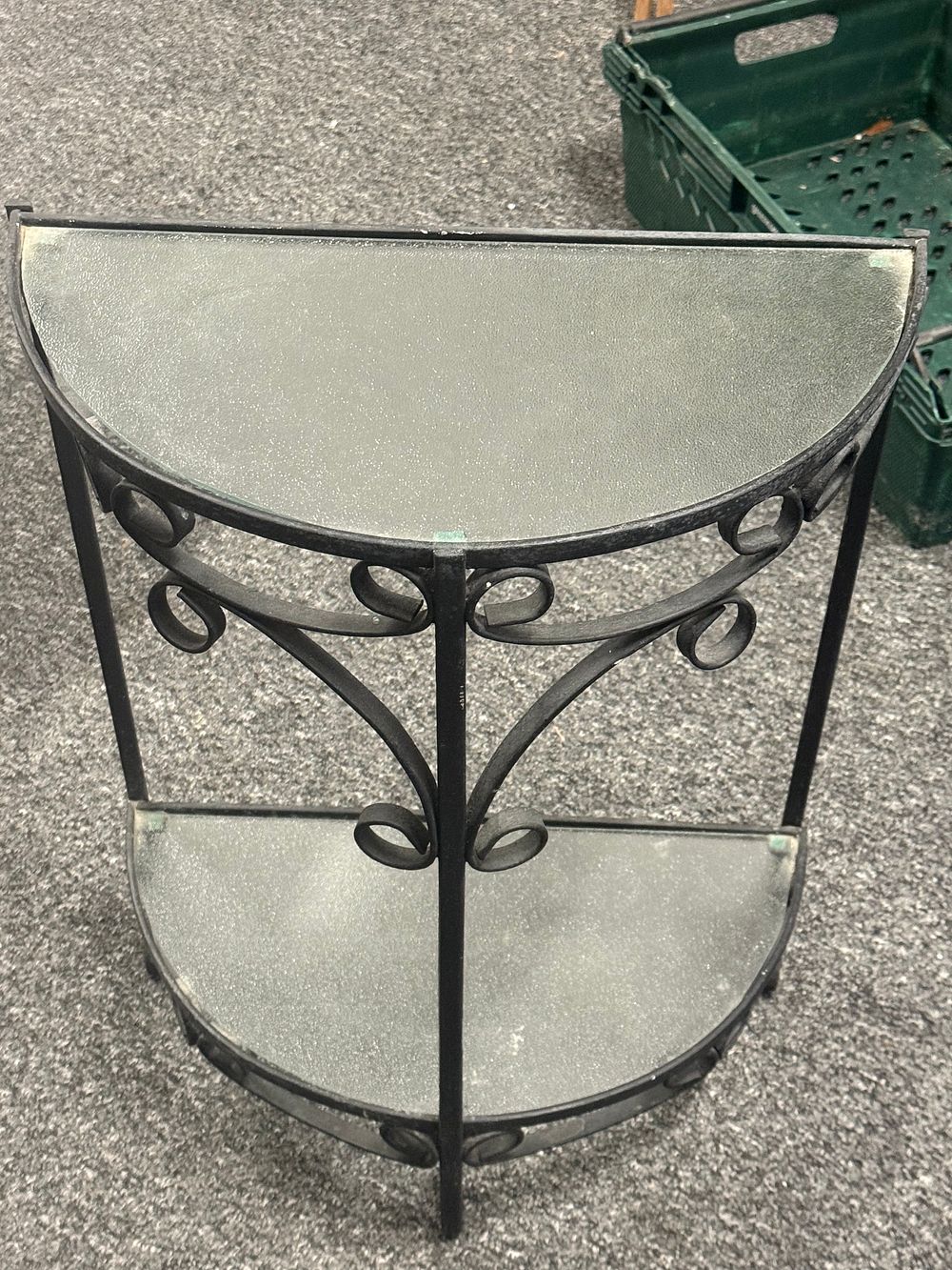 Lot 190: Contemporary black wrought iron style two-tier half moon shelving unit