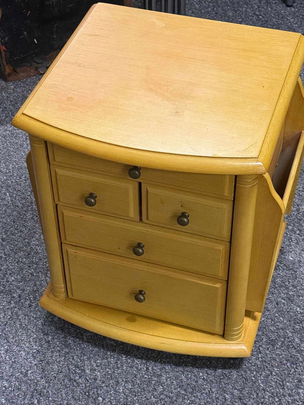 Lot 194: A honey pine effect snall chest of drawers