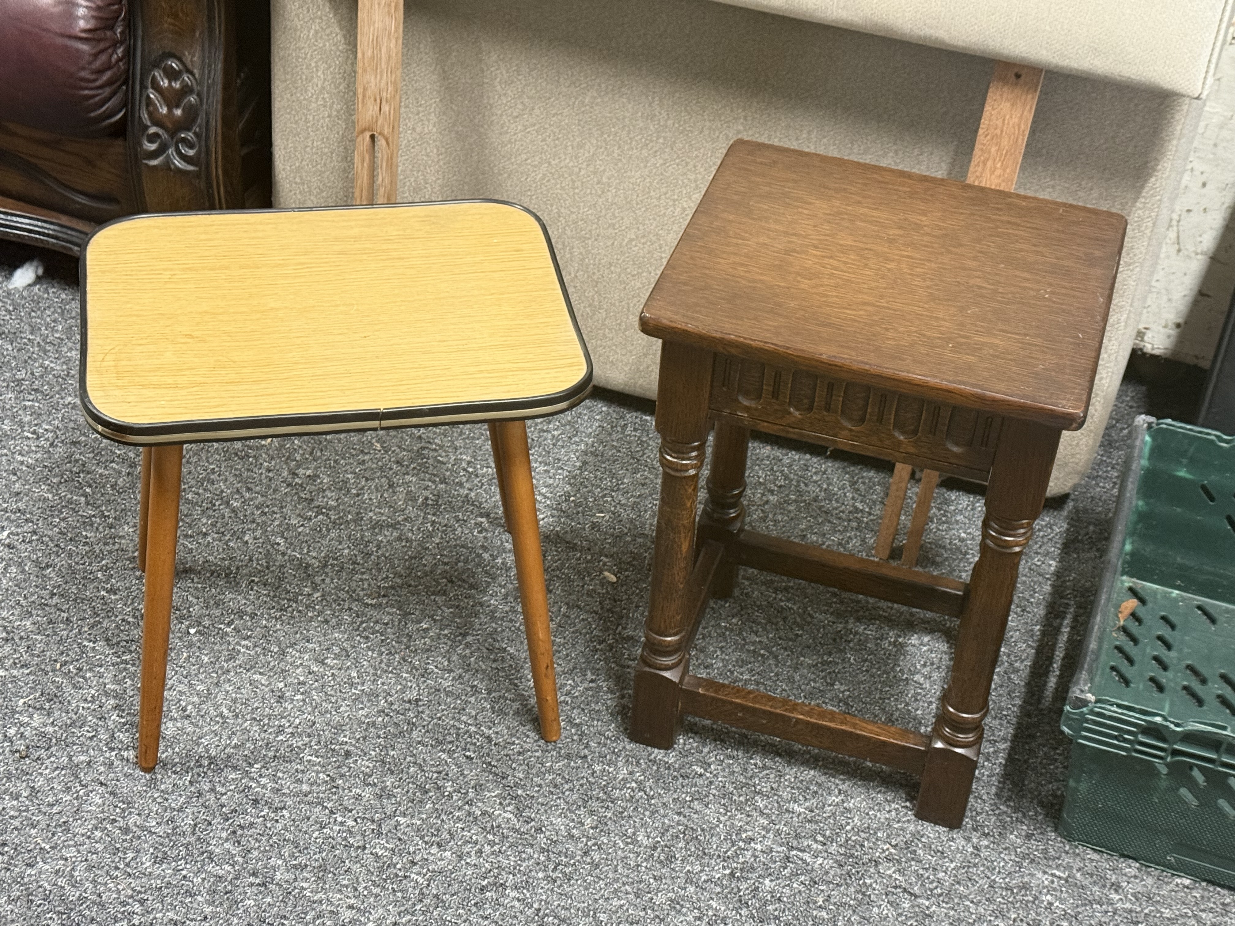 Two small occasional tables including mid-century and carved oak examples