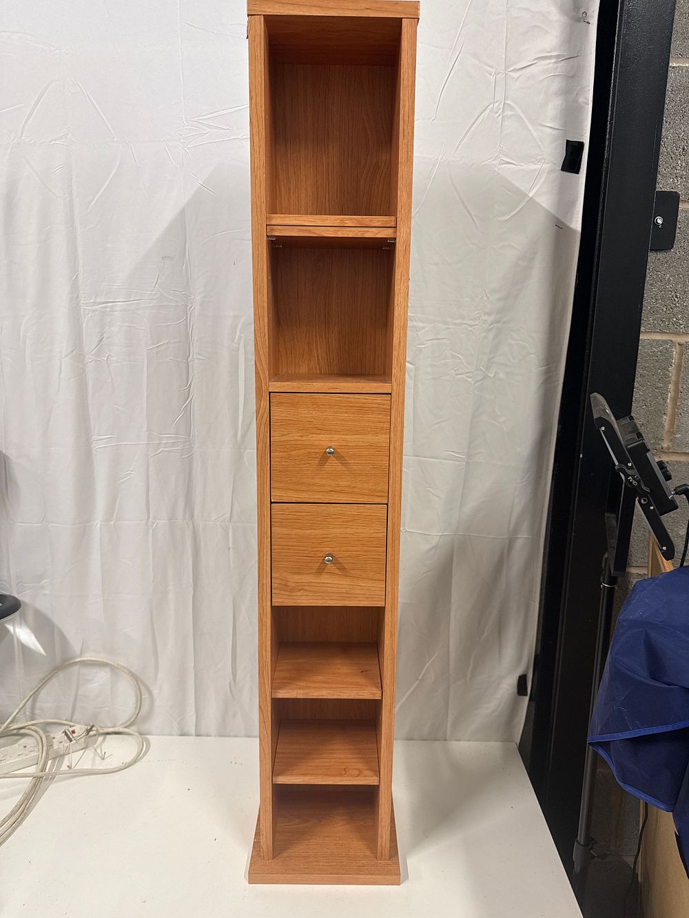 Lot 201: A contemporary light oak six-compartment storage unit
