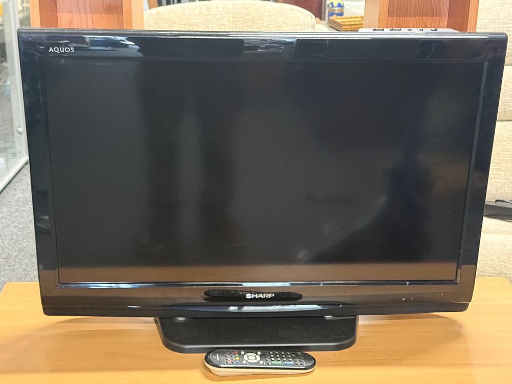 Lot 203: A Sharp Aquos 32 Inch HD Ready LCD Television