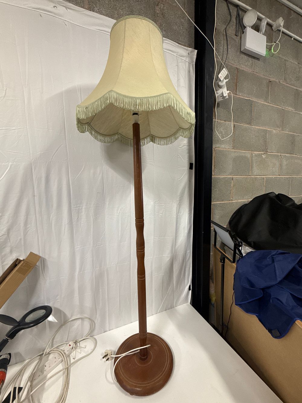 Lot 208: 20th Century turned wood floor lamp with fringed shade