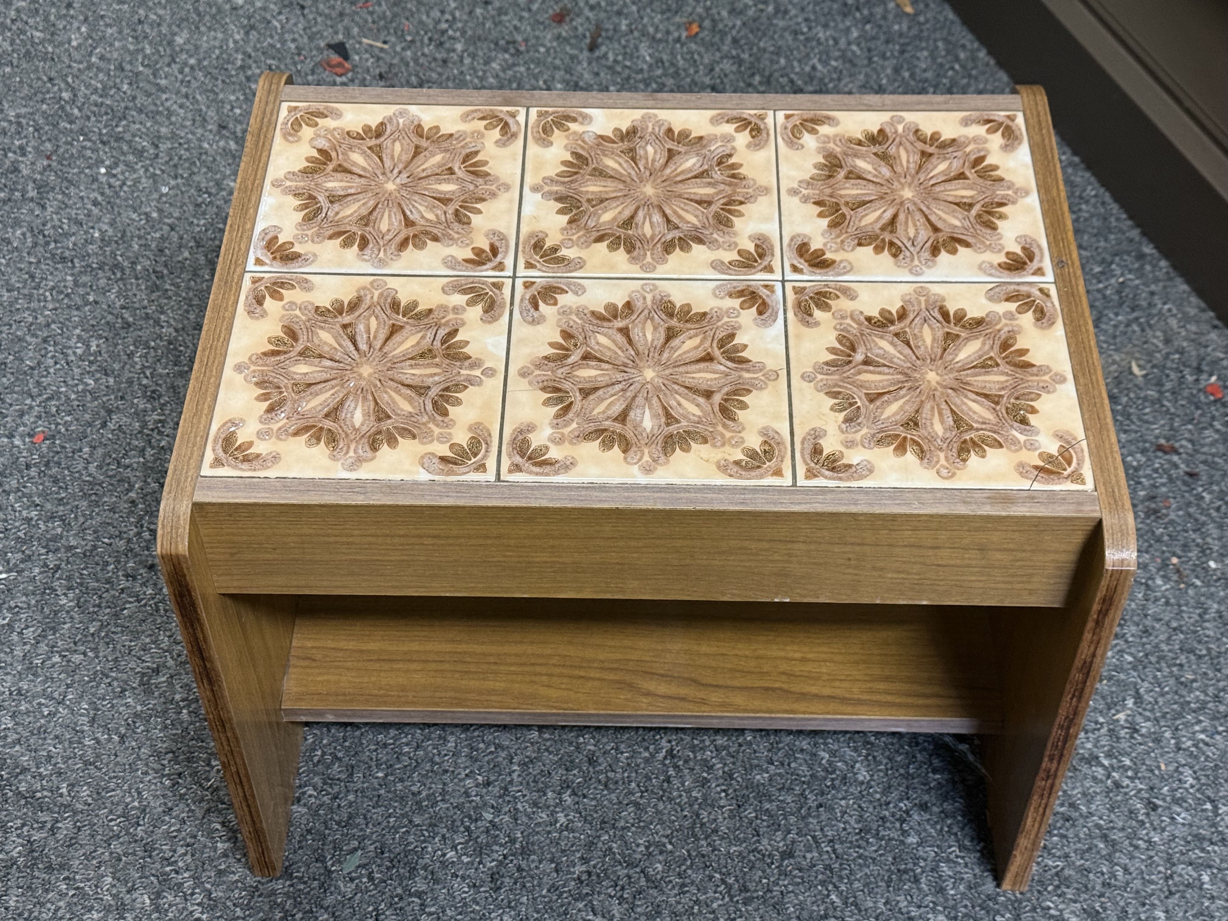 A 1970s side tavke with a decorative tiled top