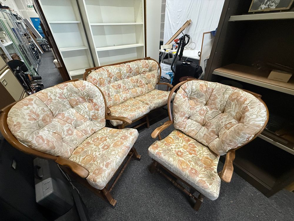 Lot 219: A three-piece cottage lounge suite with rocking armchairs