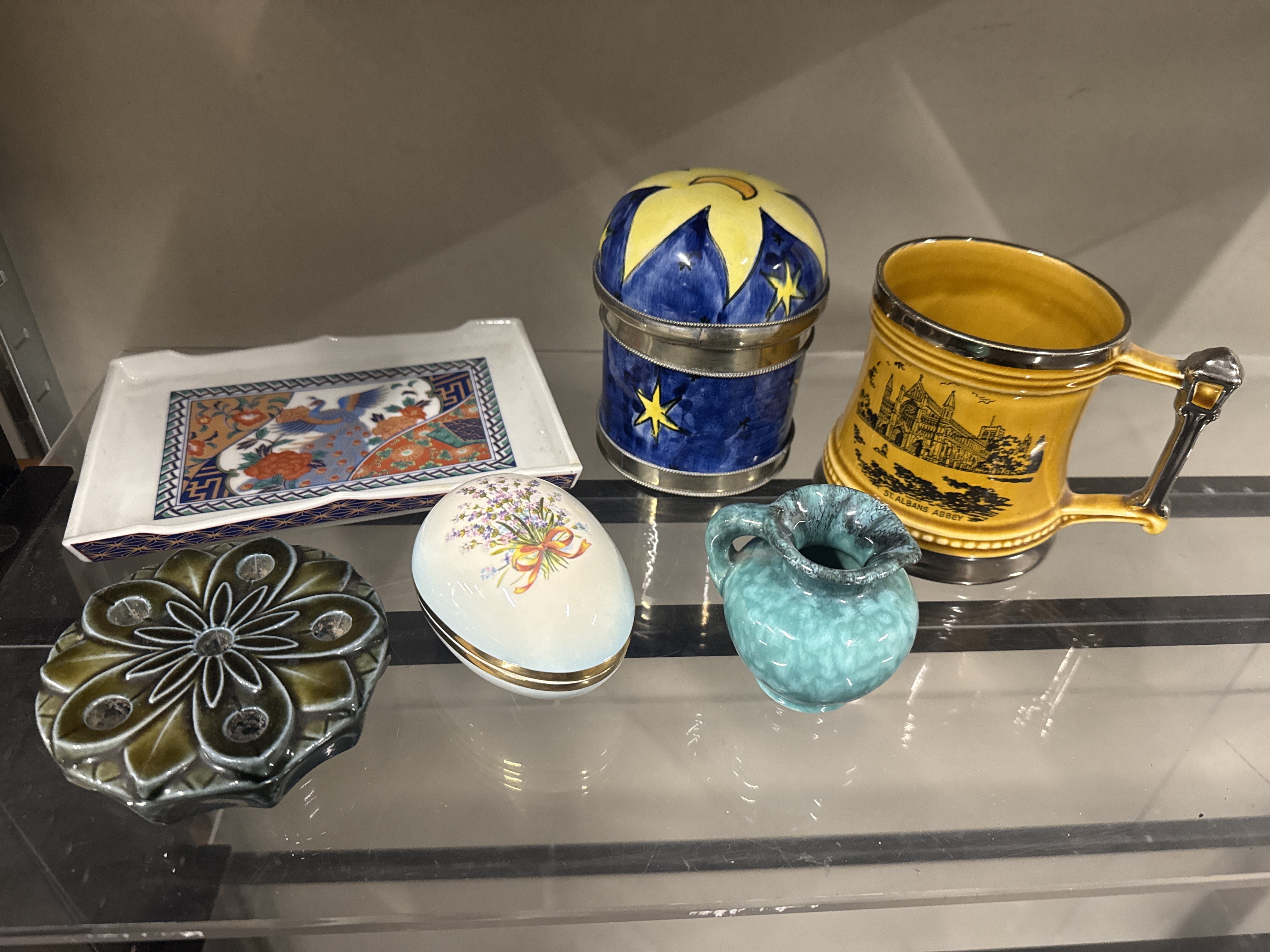 A collection of six decorative ceramic and enamel items