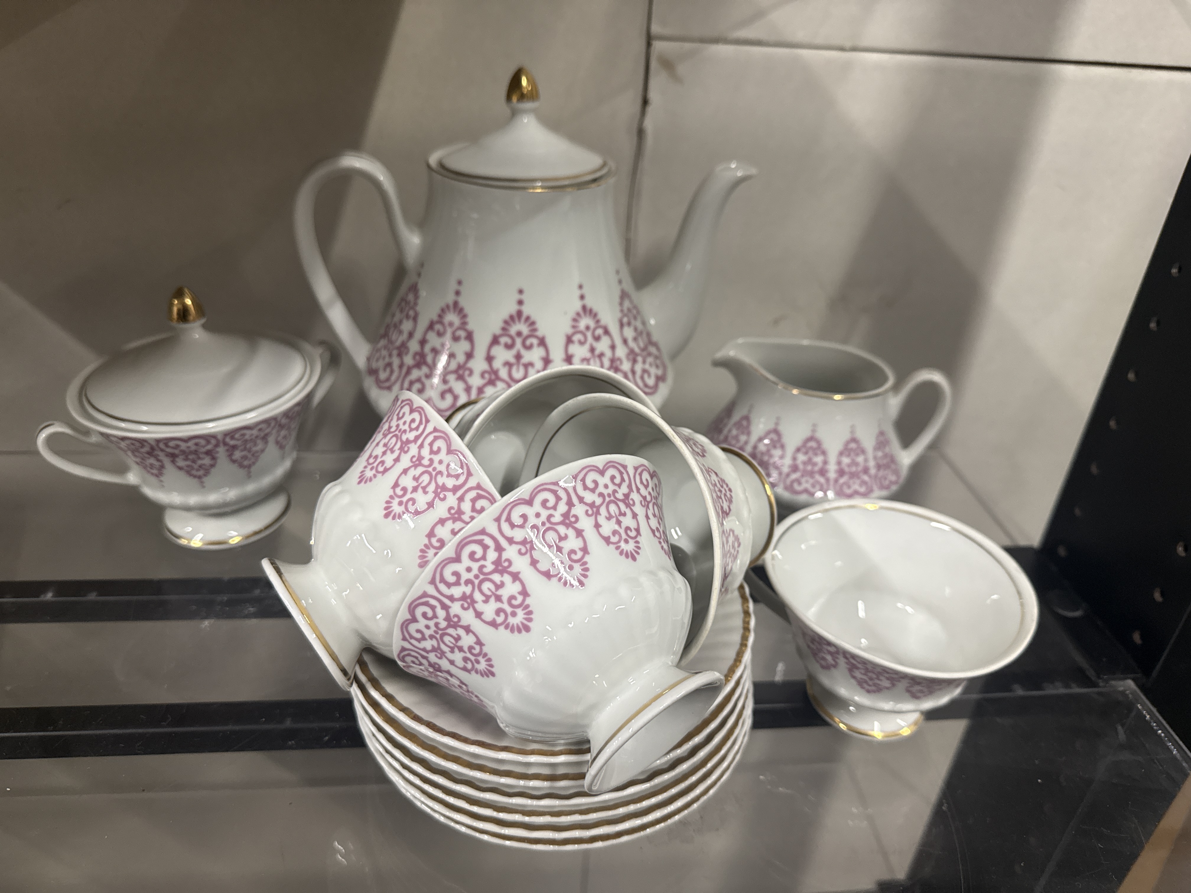 A Bulgarian Magenta Transfer-Printed Porcelain Tea and Coffee Service