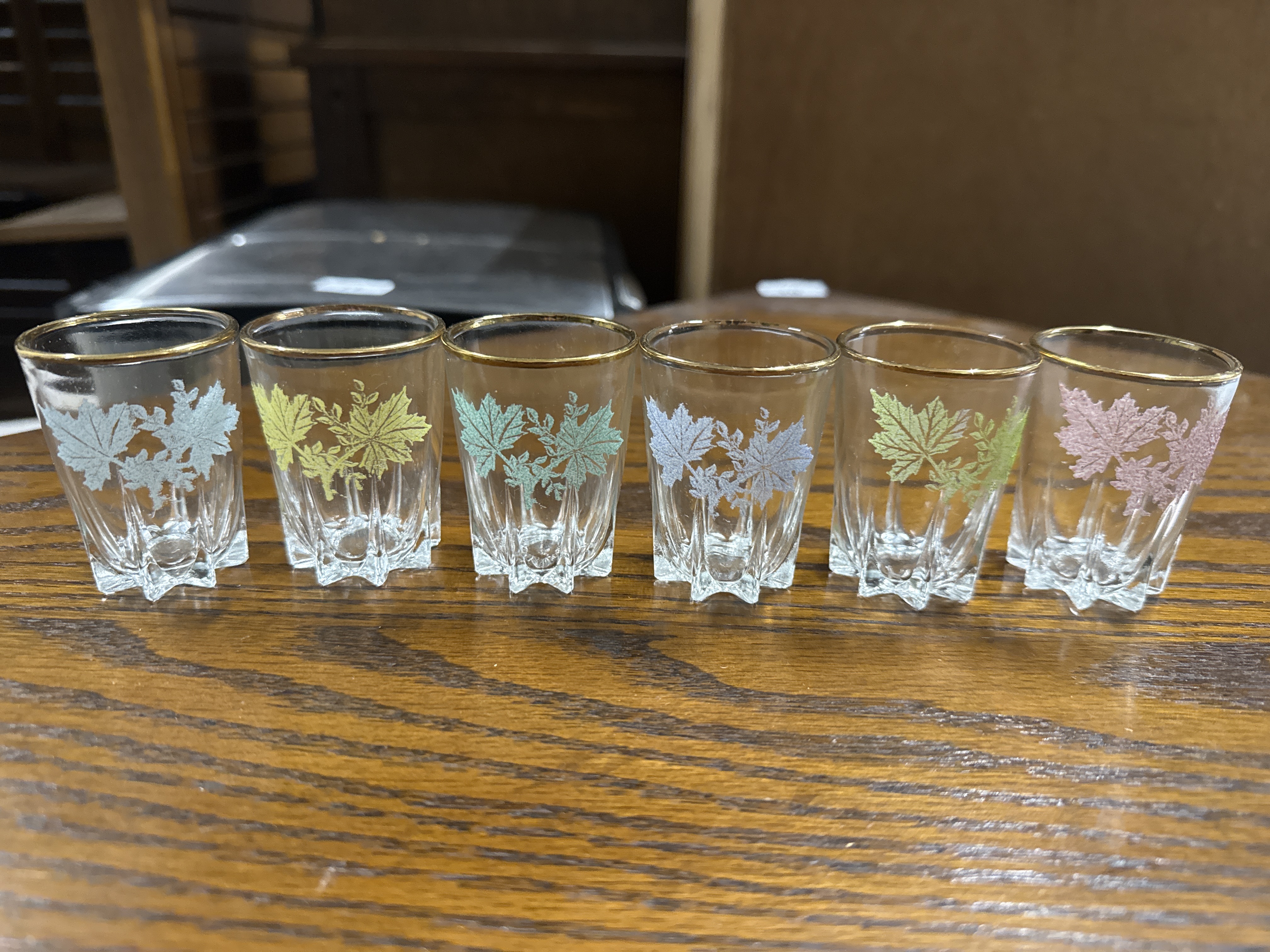 A set of six mid-century Libbey harlequin frosted leaf glasses