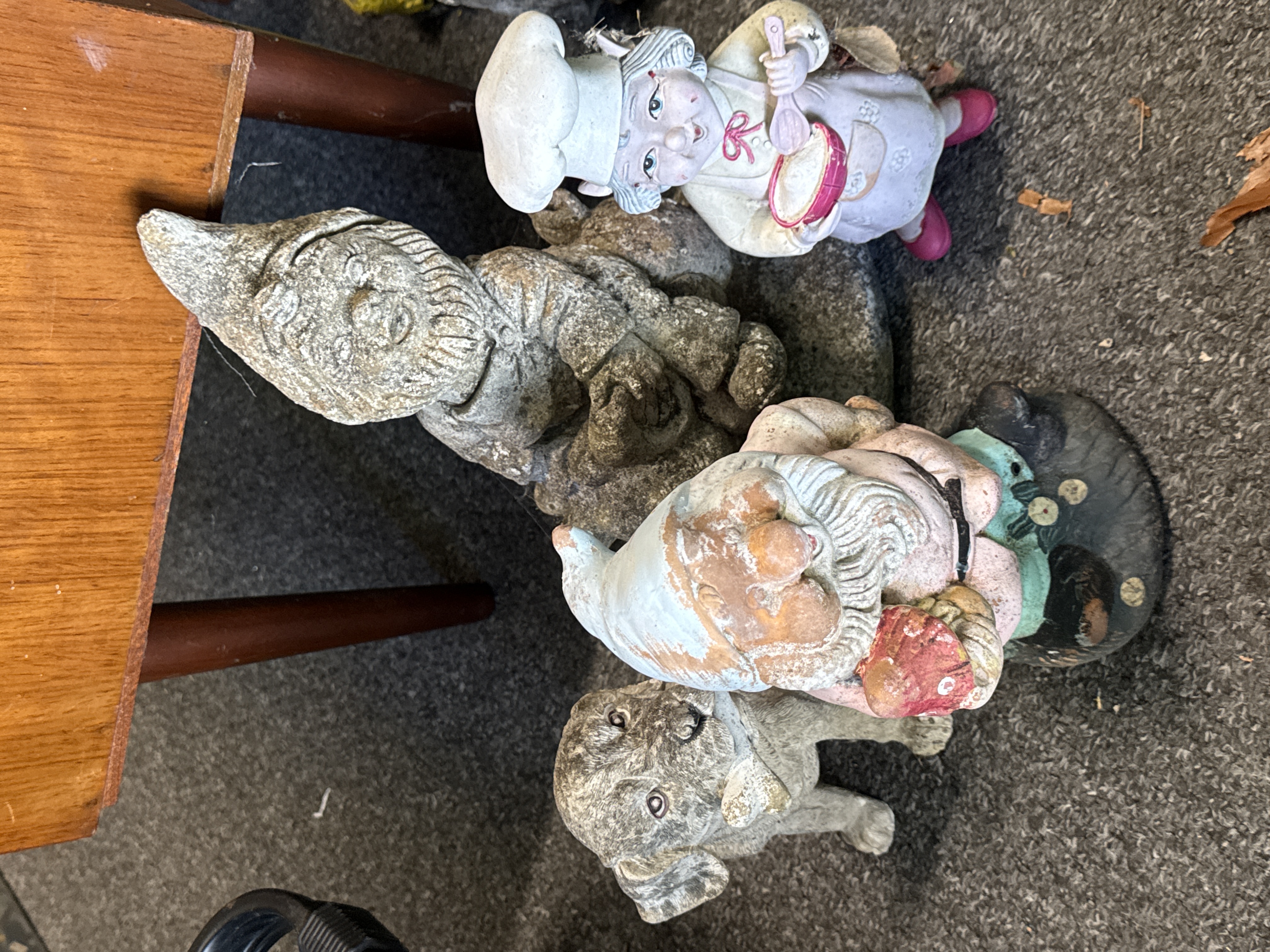 An Assortment of Stone and Resin Garden Ornaments