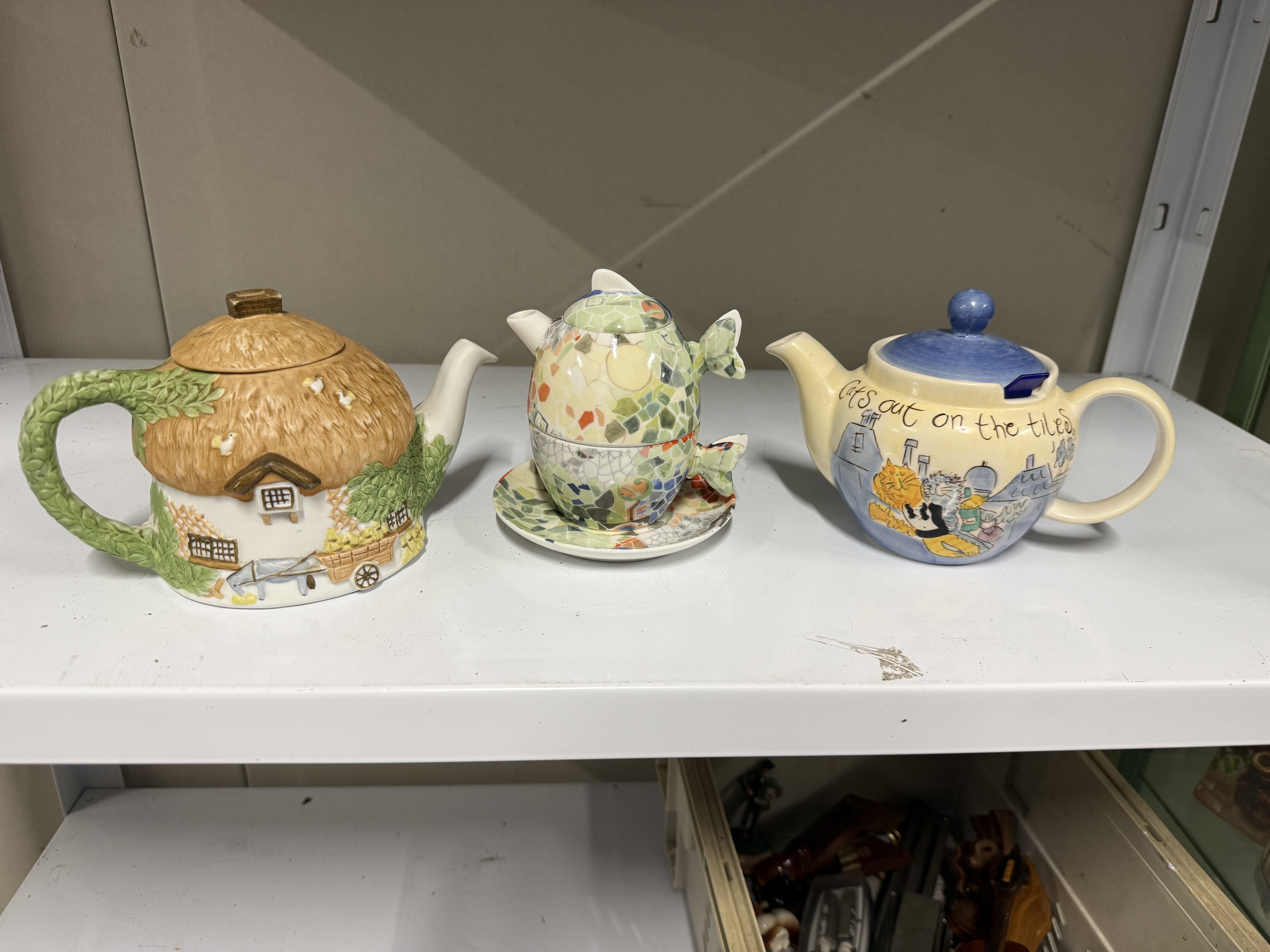 A Trio of Decorative and Novelty Ceramic Teapots