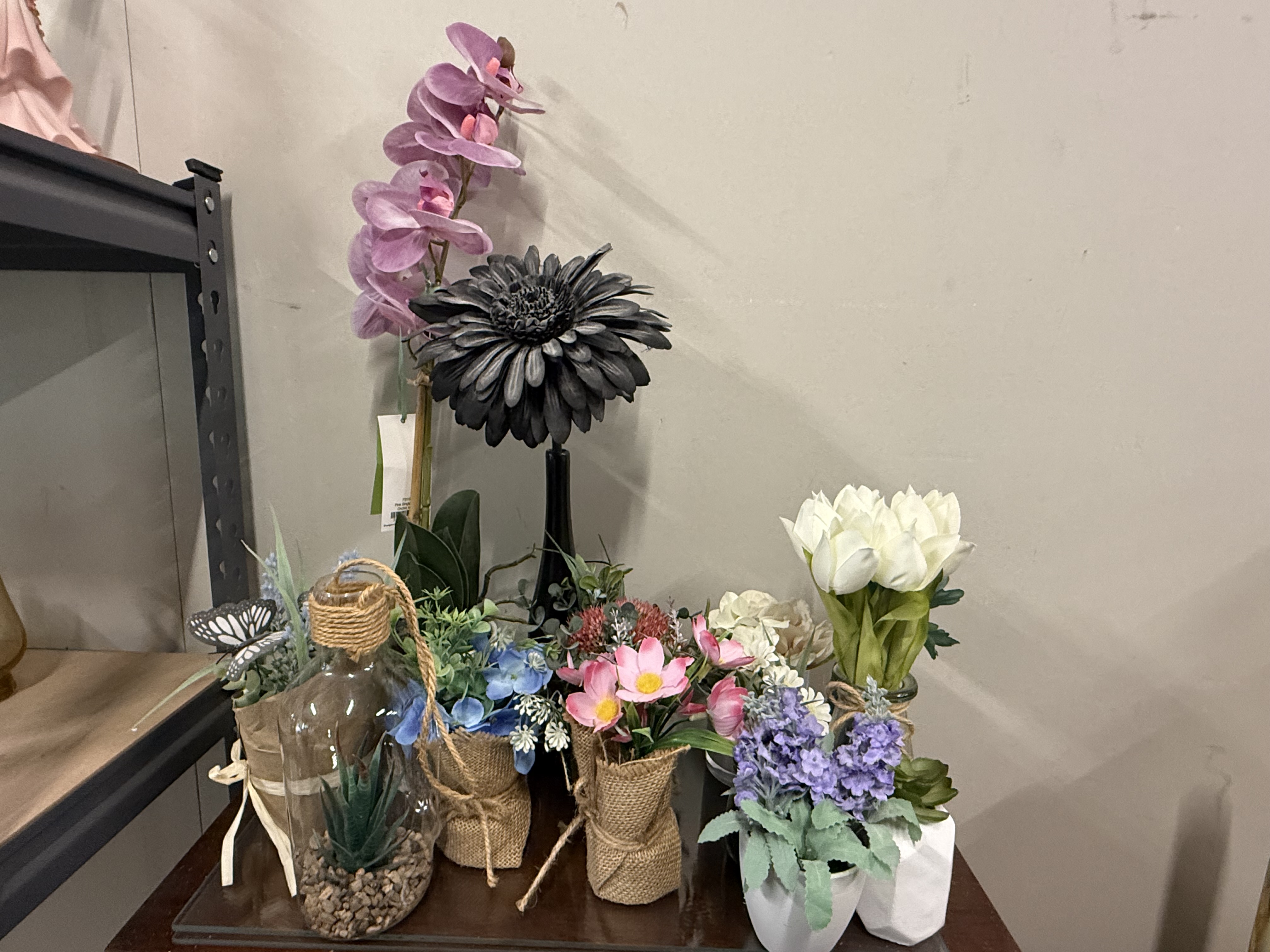 An Assortment of Decorative Artificial Floral and Plant Arrangements