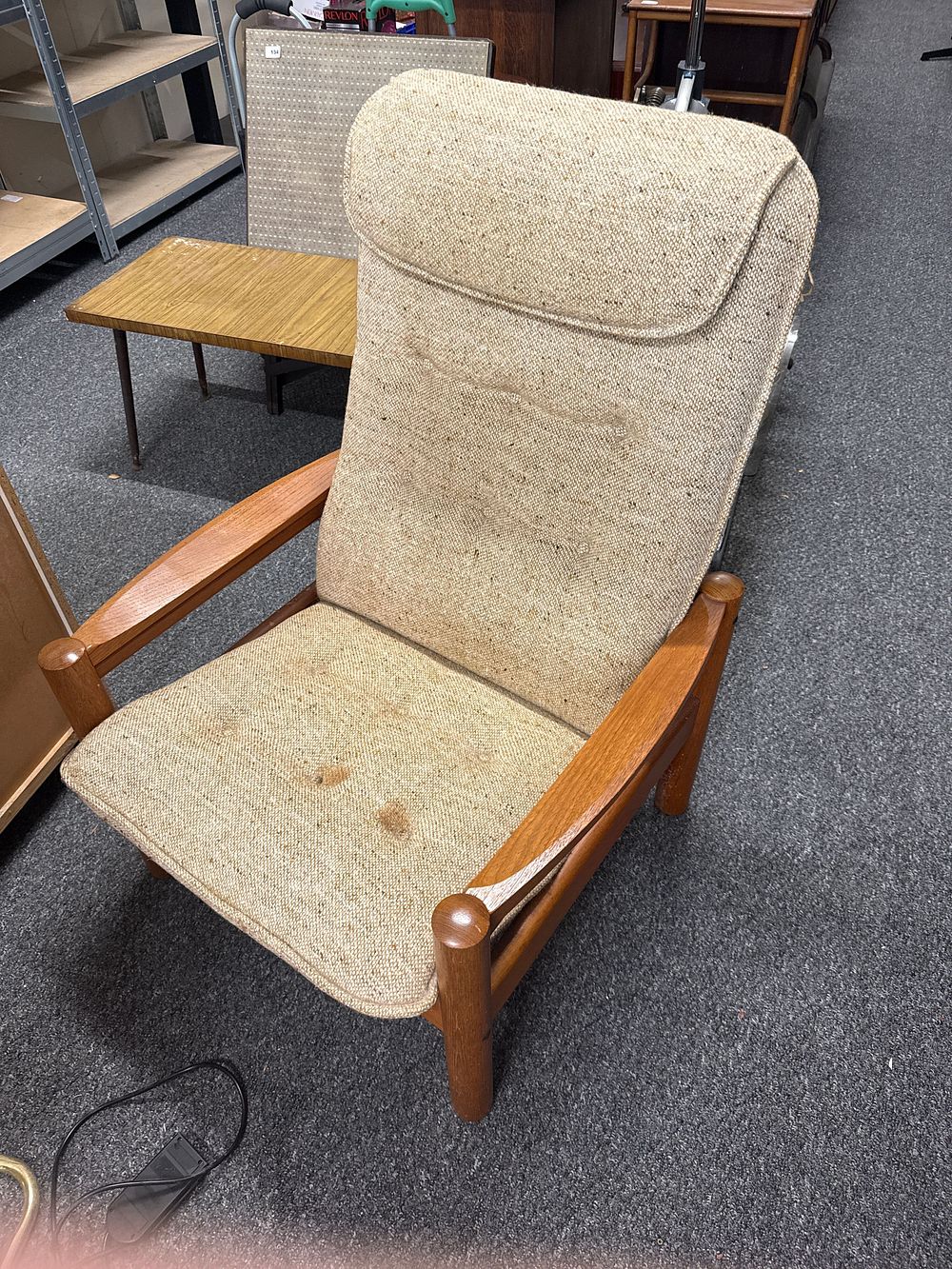Lot 154: A mid-century Danish teak high-back armchair by Domino Møbler
