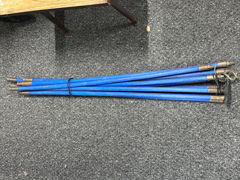 Lot 155: A set of blue Bailey flexible drain cleaning rods